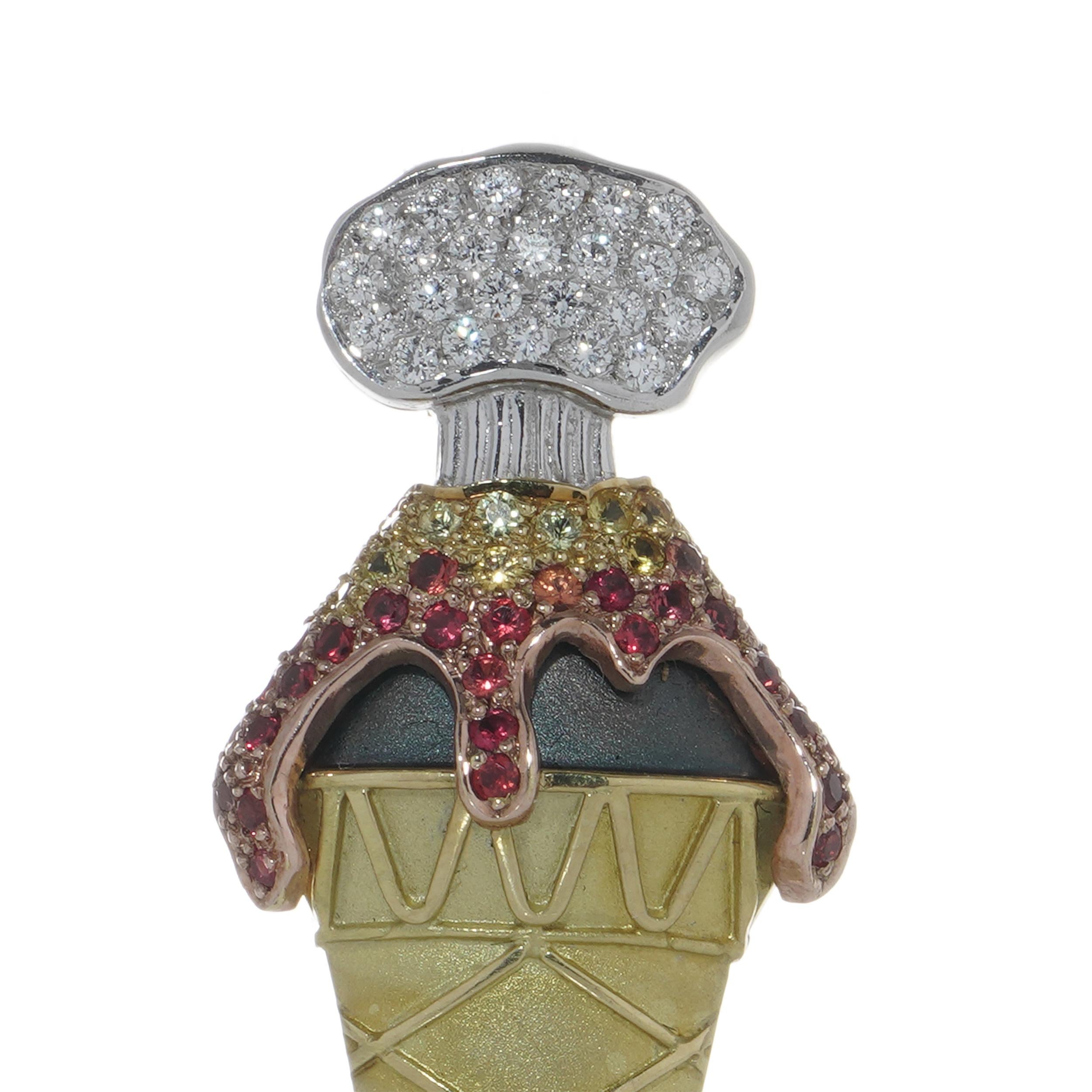 Theo Fennell 18kt gold gelato brooch, as an ice cream cone, pave set brilliant cut diamonds, brilliant cut and fancy coloured sapphires.
Made in London 2019. 
Maker: Theo Fennell.

Dimensions - 
Weight: 10 grams
Size: 4.4 x 1.6 x 0.5 cm

Diamonds