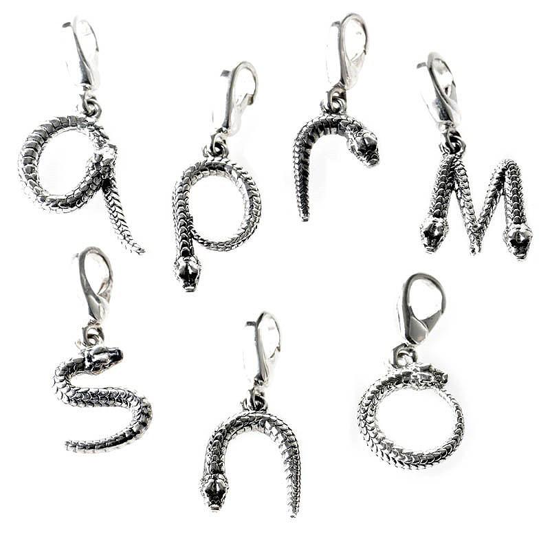 This charm from Theo Fennell is perfect for distinguishing oneself from others. The charm is made of silver and is a snake shaped like a letter. All letters are available.