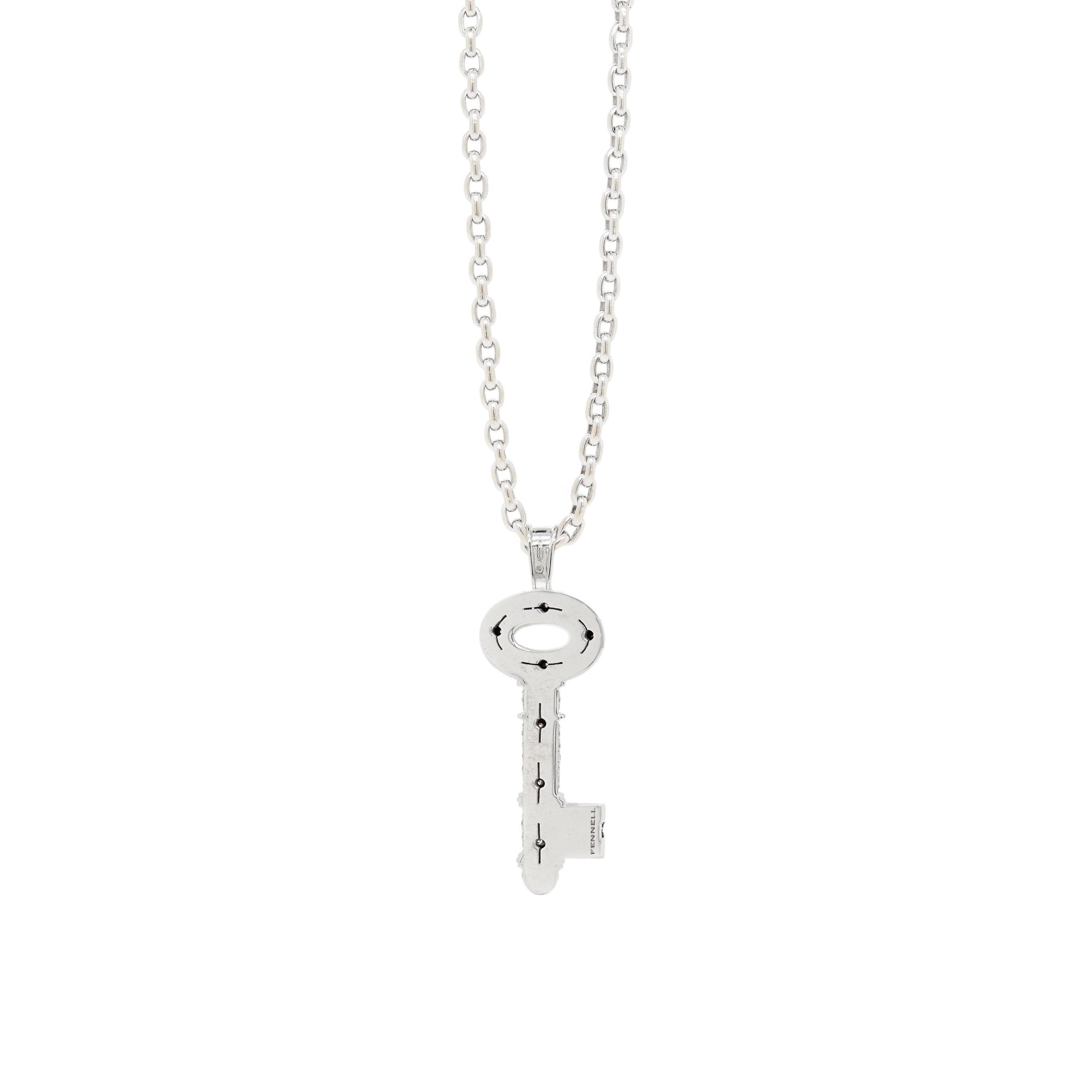 You will never get tired of wearing a statement piece like this spectacular diamond and 18 carat white gold key pendant necklace by renowned British jewellery and silverware designer, Theo Fennell.

The necklace showcases an intricate key shaped