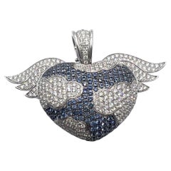 Theo Fennell Diamond, Blue Sapphire and White Gold Winged Heart Pendant