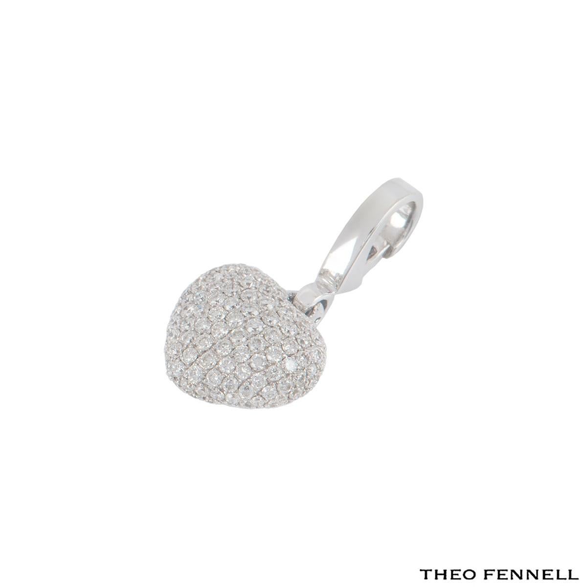 An 18k white gold Theo Fennell heart charm. The charm features round brilliant cut diamonds set in a pave setting through out with a carat weight of approximately 1.13cts. The charm features a lobster clasp and has a height of 2.3cm with a gross