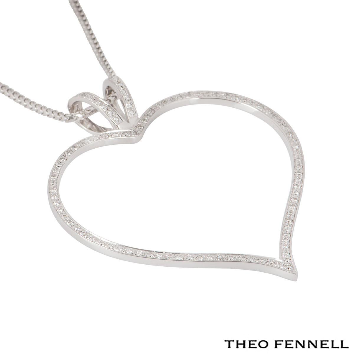 An 18k white gold diamond heart necklace by Theo Fennell. The necklace features an openwork heart motif set with approximately 128 round brilliant cut diamonds in a pave setting with an approximate weight of 0.85ct. The chain (not by Theo Fennell)