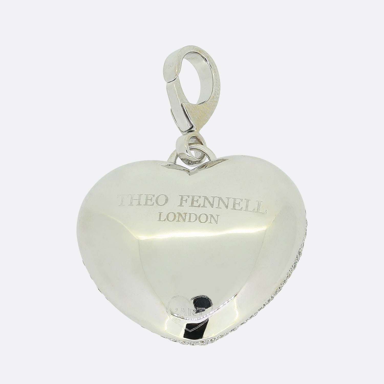 Here we have a large diamond pendant from renowned jewellery designer, Theo Fennell. This piece has been crafted from 18ct white gold into the shape of a love heart and pave set with a vast array of perfectly matched round brilliant cut diamonds.