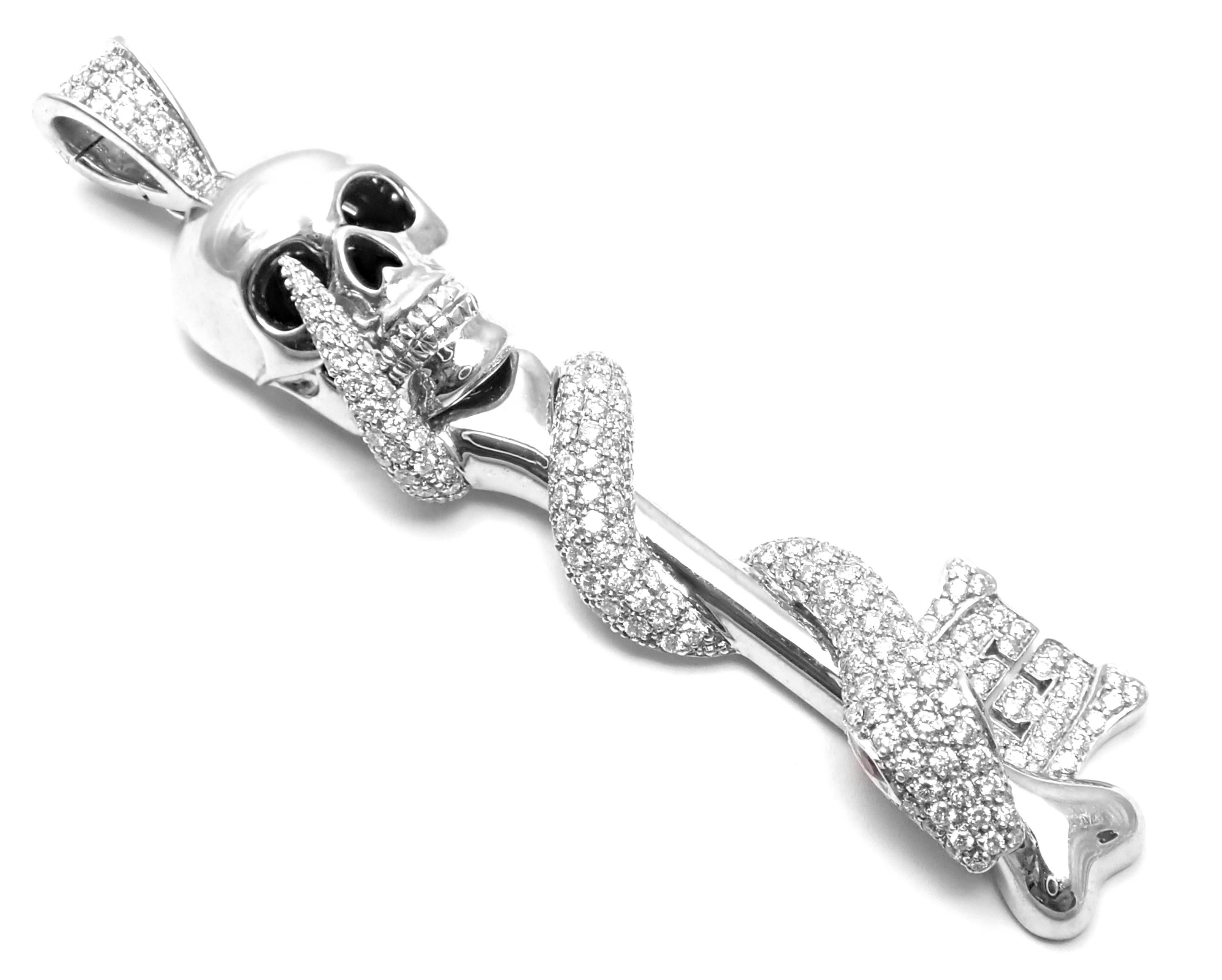 18k White Gold Diamond Rubies Large Skeleton Key Pendant by Theo Fennell. 
With Round brilliant cut diamonds VS1 clarity, G color
2 round rubies in the eyes
Details: 
Weight: 20.6 grams
Measurements: 2 3/4