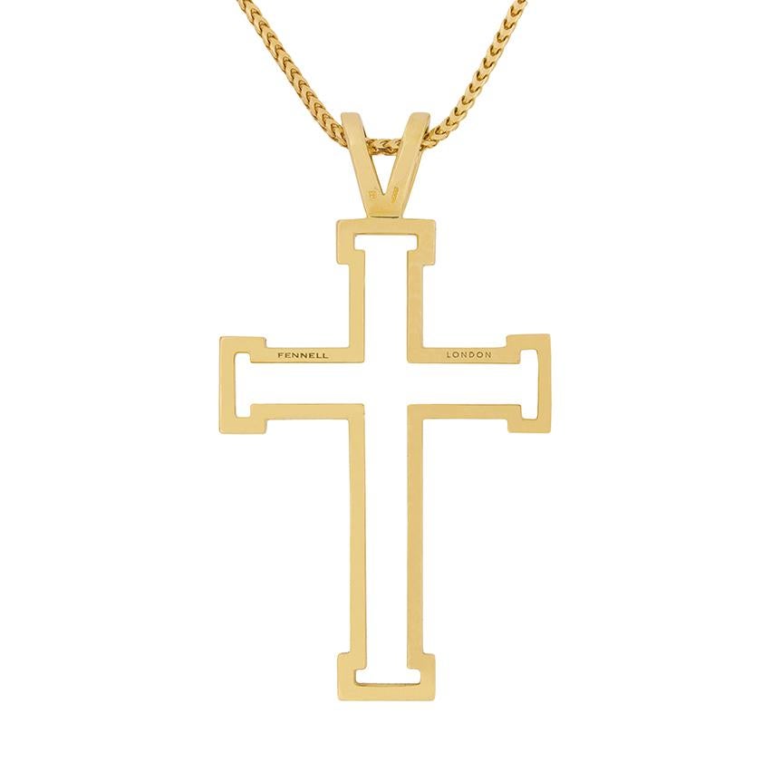 This product has since been discontinued by Theo Fennell, making it a rare piece. The pendant is cross shaped and made of 18 carat yellow gold. It is hallmarked Fennell London, and TF on the bail. This piece does not come with the chain.

Designer: