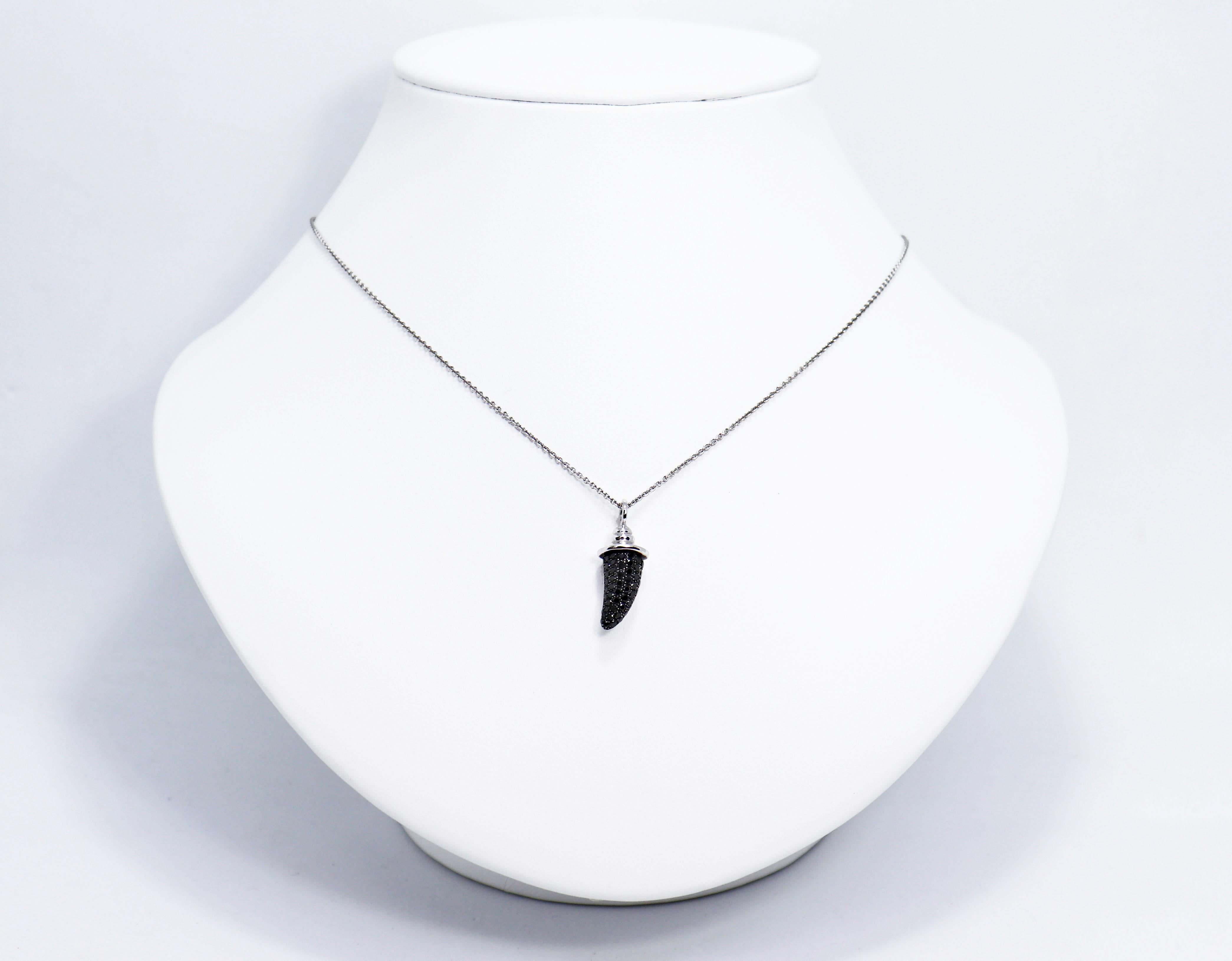 Theo Fennell London horn pendant half pavé-set with round brilliant cut black diamonds, mounted in 18 carat white gold featured on a 16