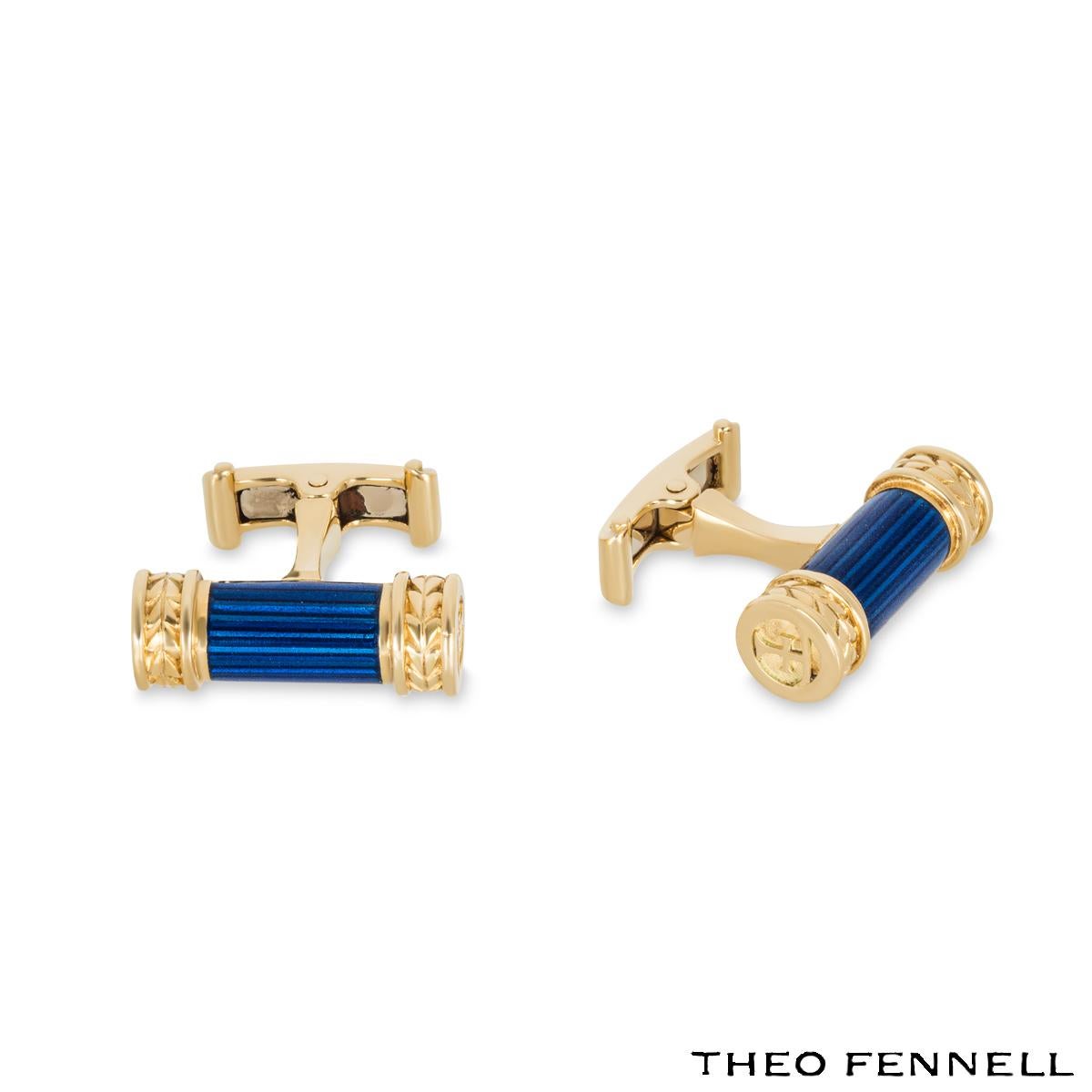 An 18k yellow gold pair of enamel cufflinks by Theo Fennell. The cufflinks are set with blue enamel through the middle with gold sides that have the iconic 'TF' motif. The cufflinks have a classic hinged T bar fitting. The cufflinks measure 0.8