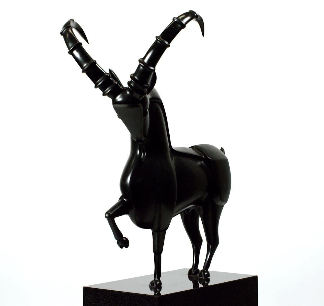 Steenbok Capricon Ibex Zodiac Bronze Sculpture Black Contemporary
Theo Mackaay (1950)

Mackaay works with recognizable shape:: women, men and animals, with a pointer at the primal form. Archetypal motives like warriors, women, horses, archers,