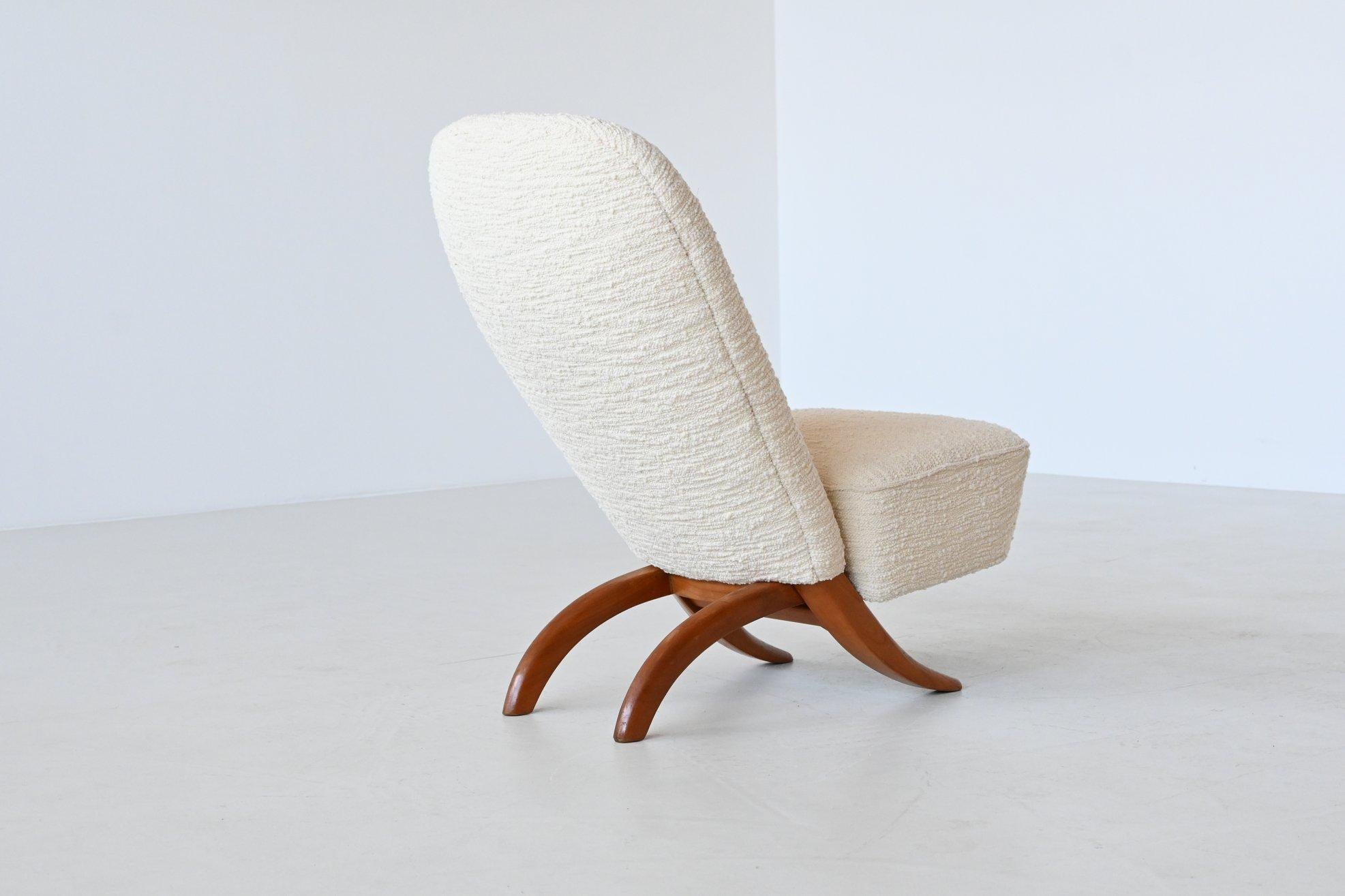 Stunning “Congo” lounge chair designed by Theo Ruth and manufactured by Artifort, The Netherlands 1957. An absolutely progressive design. This chair consists of two parts, easy to disassemble and store. Stylish design because of the beautiful beech