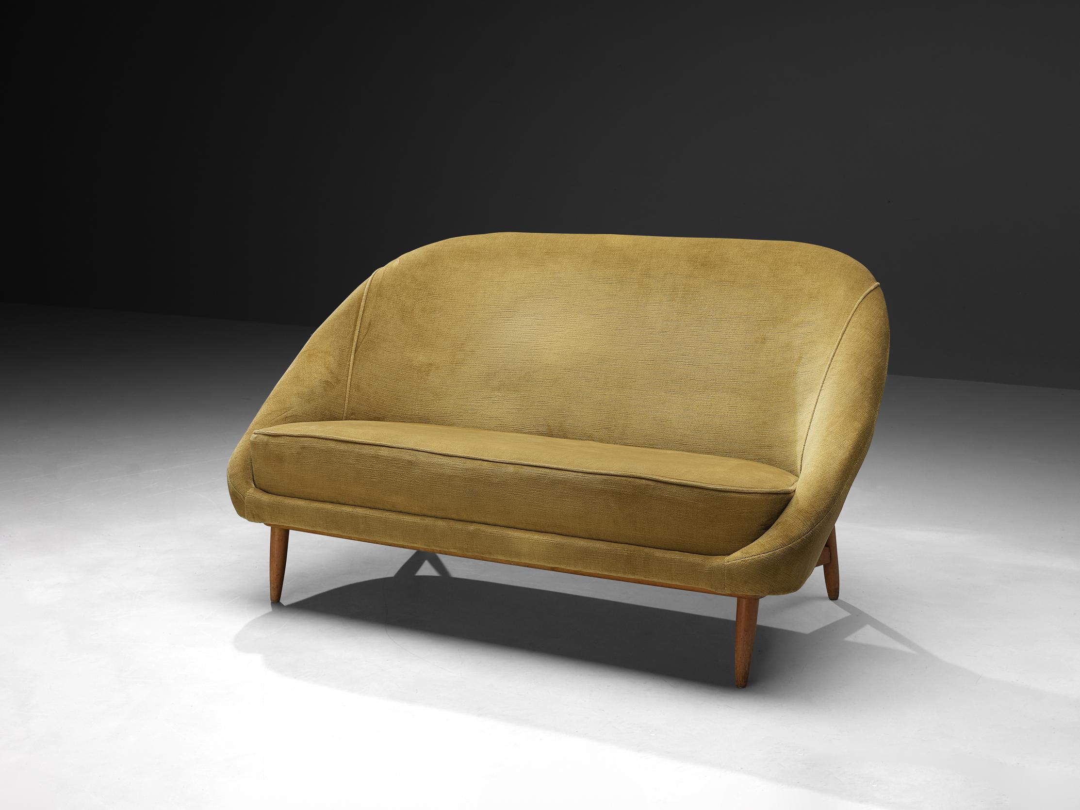 Theo Ruth for Artifort, sofa, model '115', fabric, wood, The Netherlands, 1950s

A Dutch settee by Theo Ruth currently upholstered in a yellow velvet. The back tilts slightly backwards and has the recognizable natural flow and feel of Ruth's design.
