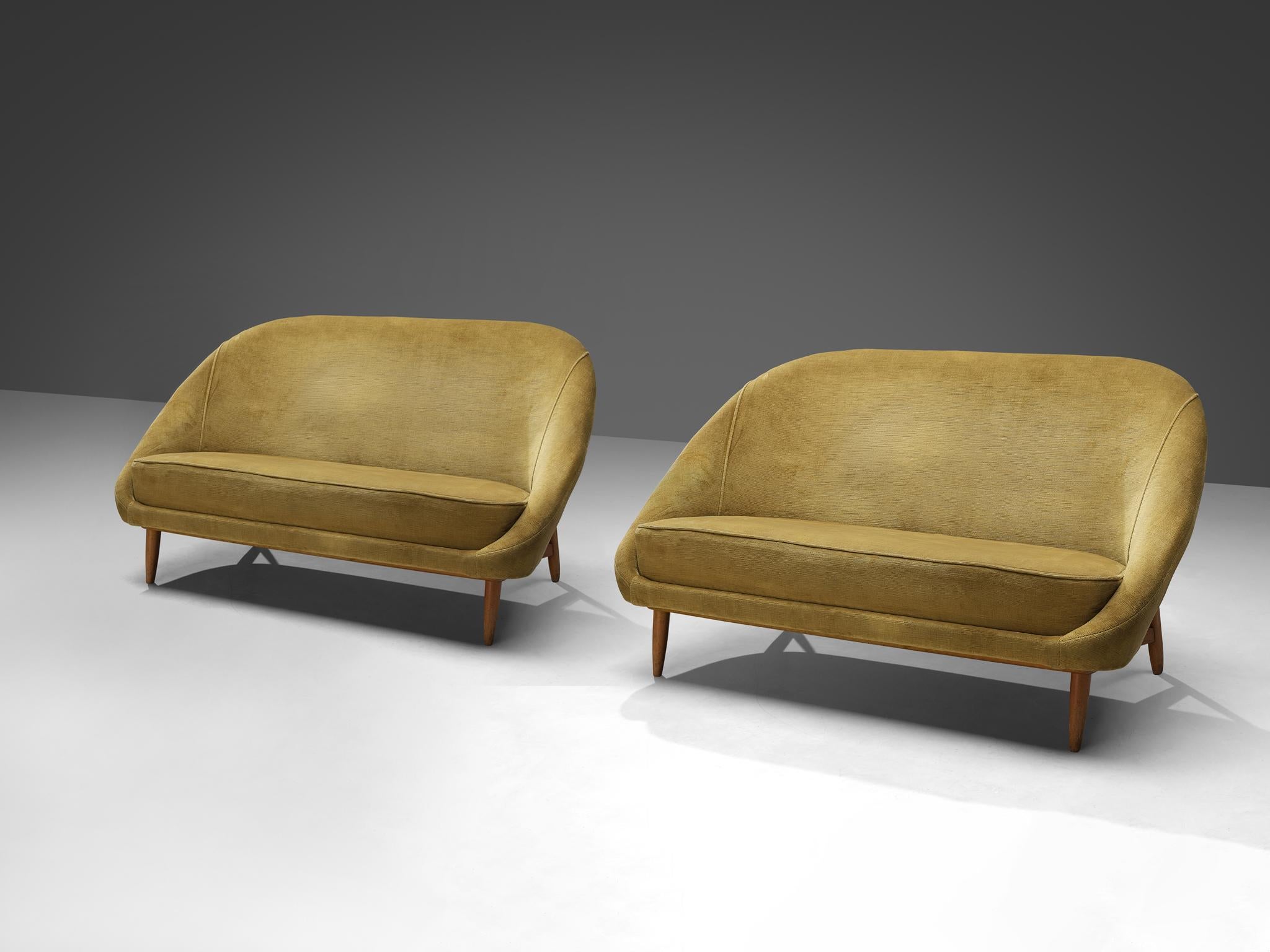 Theo Ruth for Artifort, sofa model '115', fabric, wood, Netherlands, 1950s

Dutch settees by Theo Ruth currently upholstered in a yellow velvet. The back of these sofas tilts slightly backwards and has the recognizable natural flow and feel of