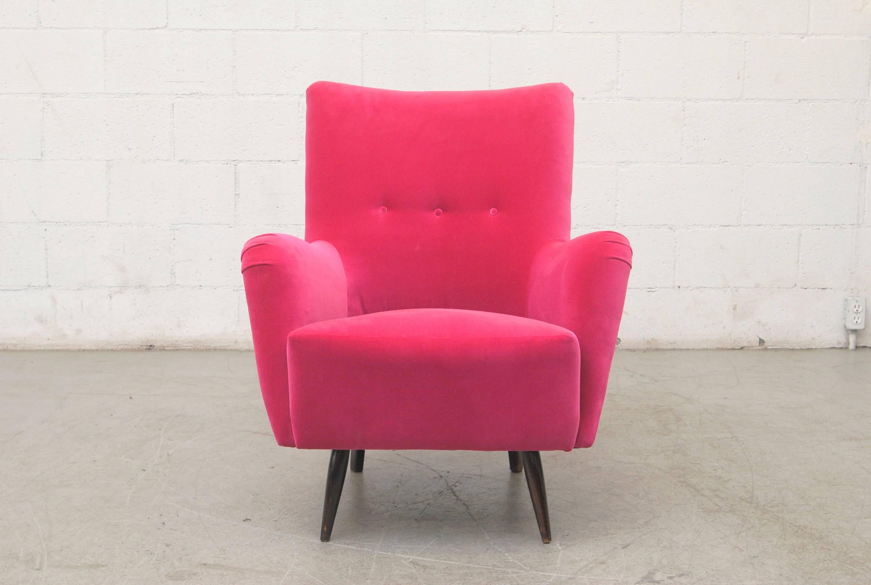 Vintage high back Theo Ruth lounge chair, circa 1956, newly upholstered in hot pink velvet with original dark stained legs.