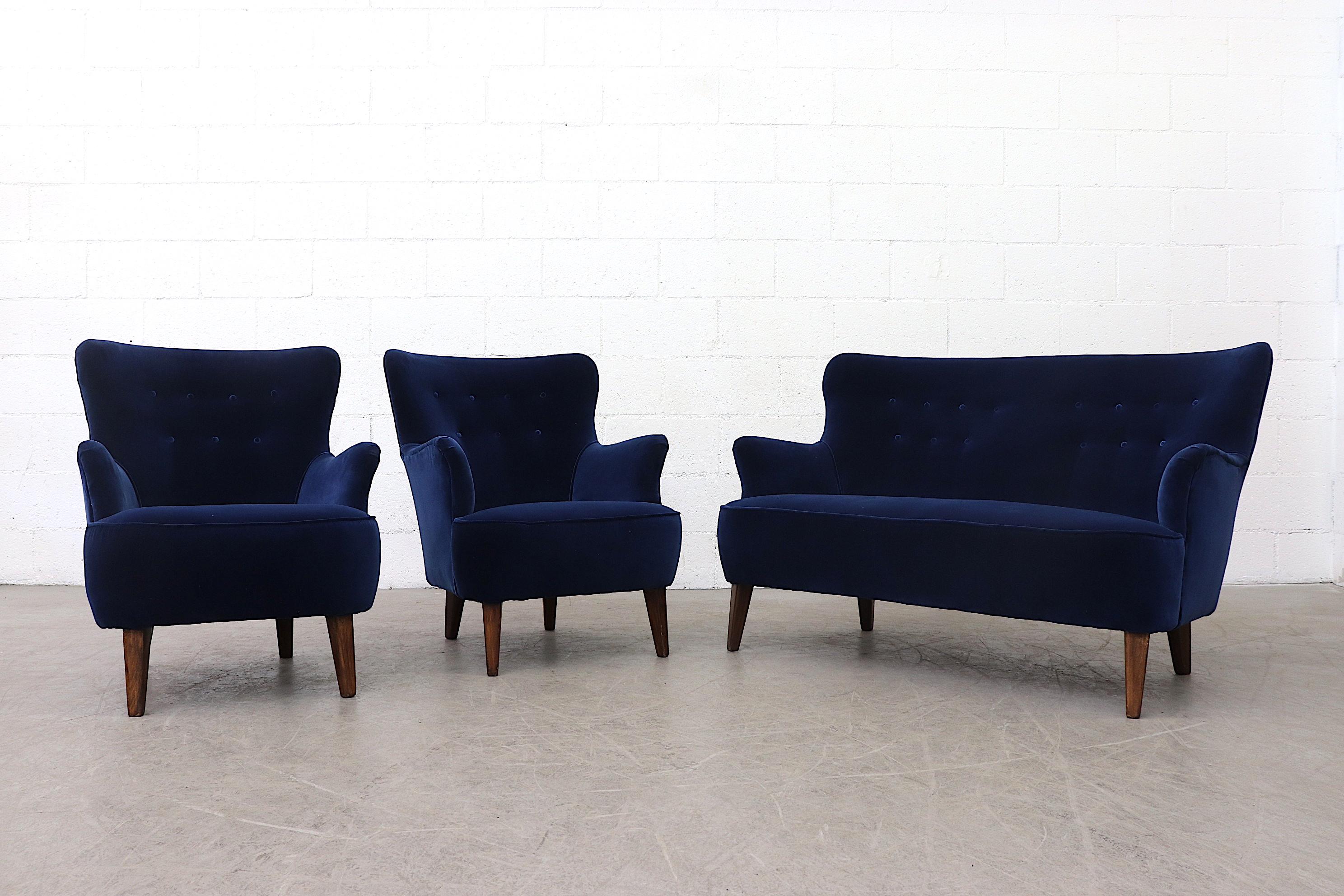 Theo Ruth Loveseat for Artifort newly upholstered in navy blue velvet. Legs in original condition with wear consistent with its age and use. Pictured with matching lounge chairs (LU922414476222). Also available and listed separately.