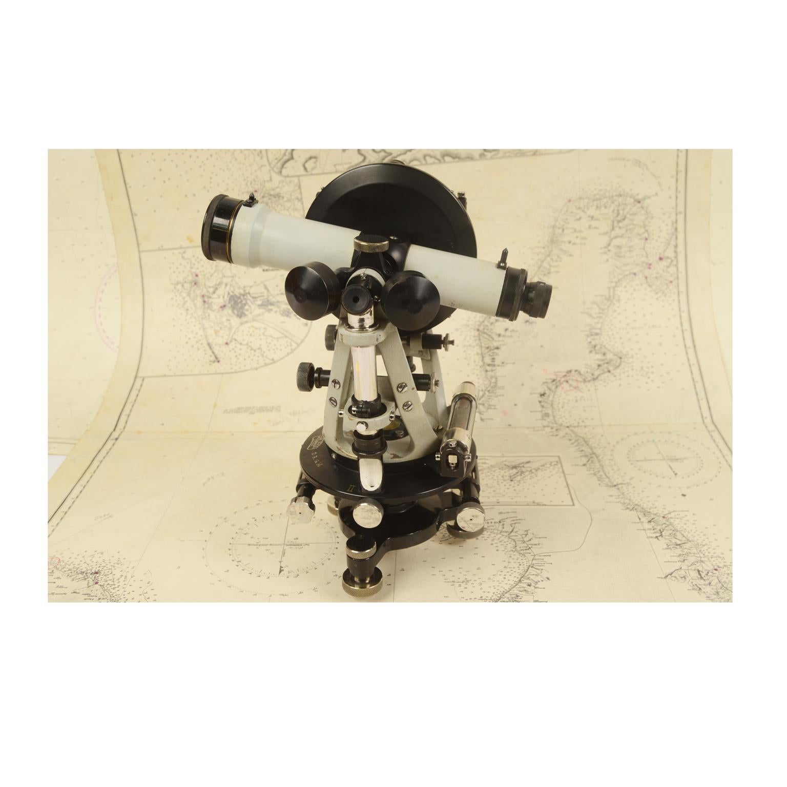 Theodolite by Carl Zeiss Jena D.R.G.M. 1920s, light gray and black painted brass, internal horizontal and vertical circle with microscope readings, rack and pinion focusing. Very good condition, some signs of use and fully functional. Measures:
