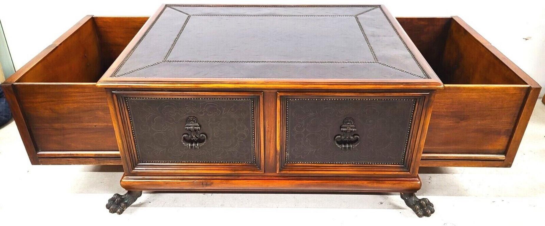Offering One Of Our Recent Palm Beach Estate Fine Furniture Acquisitions Of A 
THEODORE ALEXANDER Armoury Collection William and Mary Style Etched Brass Cocktail Table
Featuring 2 large drawers on either side, studded etched brass floral and