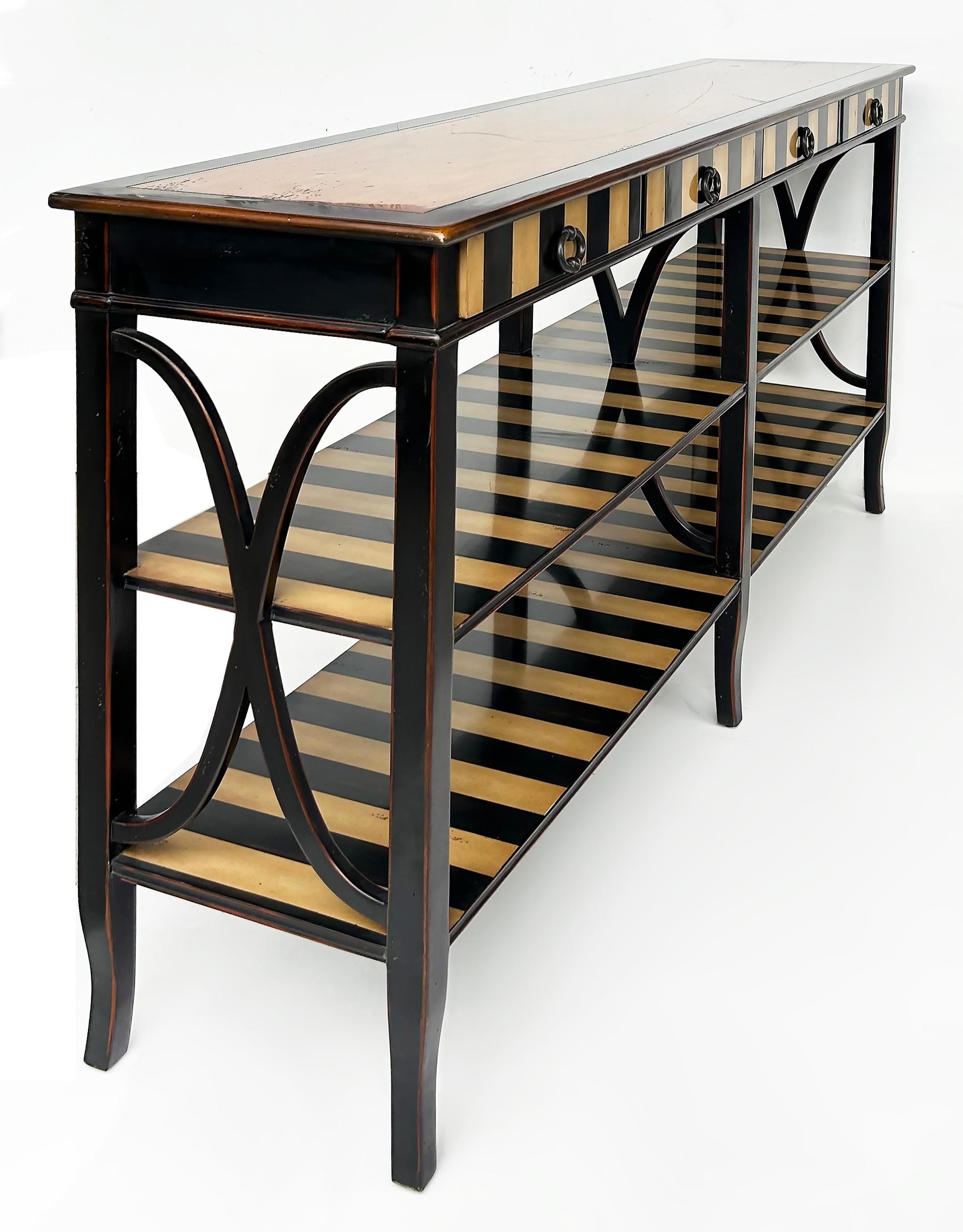 Theodore Alexander Atelier de Madeleine Console Table, Ebonized and Striped Wood

Offered for sale is a Theodore Alexander Atelier de Madeleine ebonized and striped wood console table.  The top section of the console table has four drawers.  Below