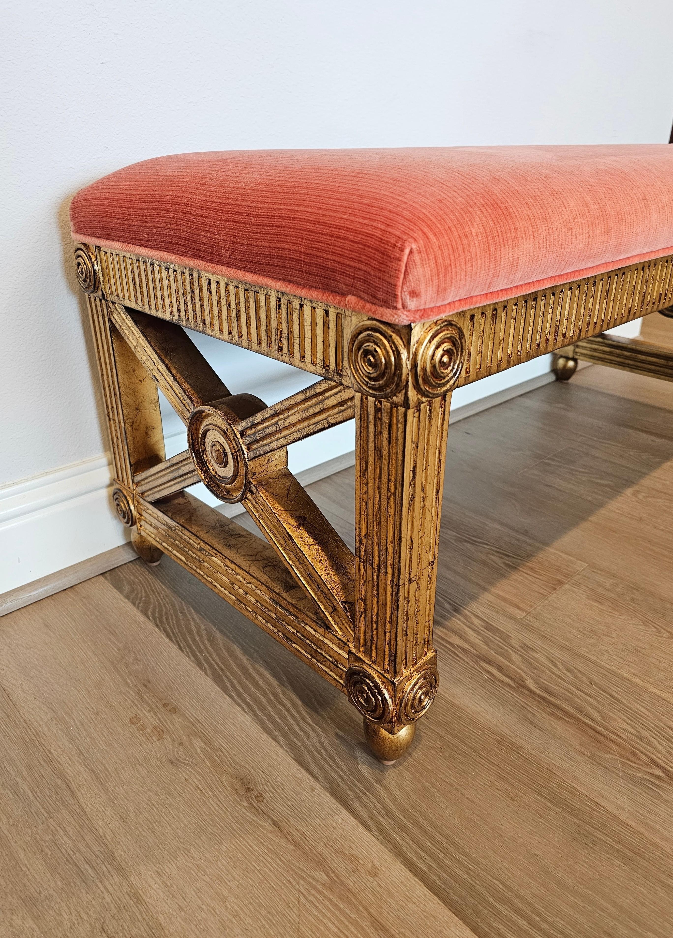 A stunning contemporary Neo-classical style Gregory bench by fine quality luxury furniture designer Theodore Alexander. 

The Gregory features a sophisticated Louis XVI style Neoclassical inspired design, having a reeded upper rail, fluted legs and