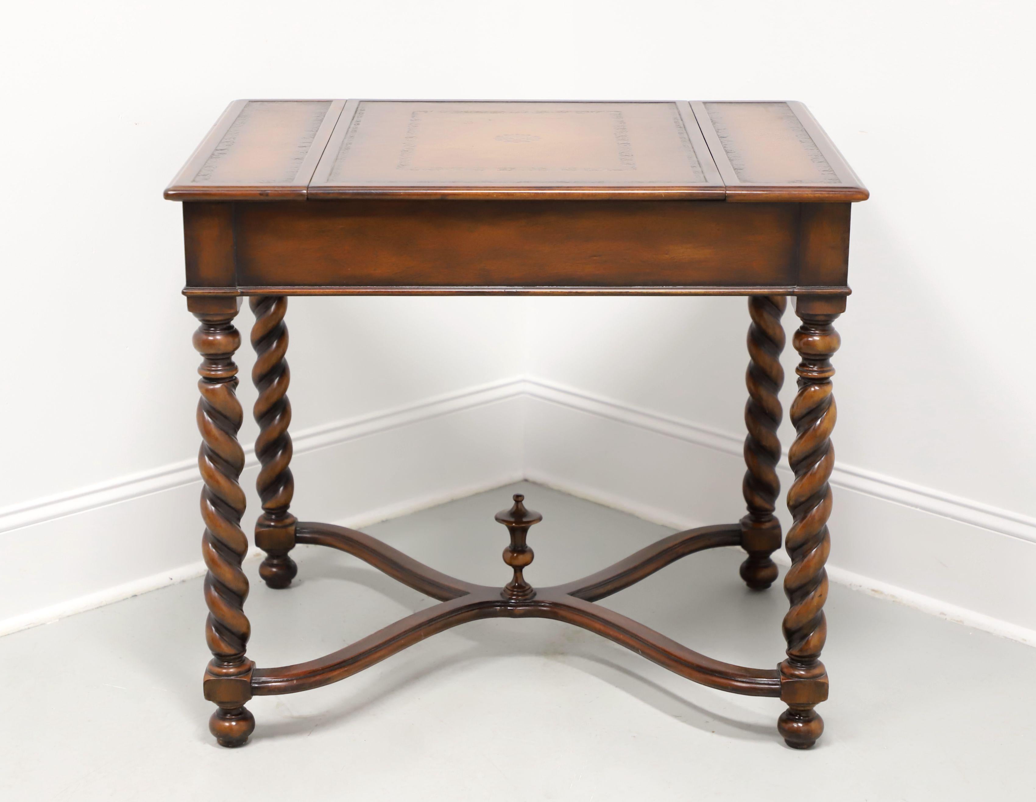 A William & Mary style game table by Theodore Alexander, from their Essential Collection. Walnut with acacia wood, inlays, tooled & embossed leather top, reversible & removable top center section, brass knob hardware, barley twist turned legs joined