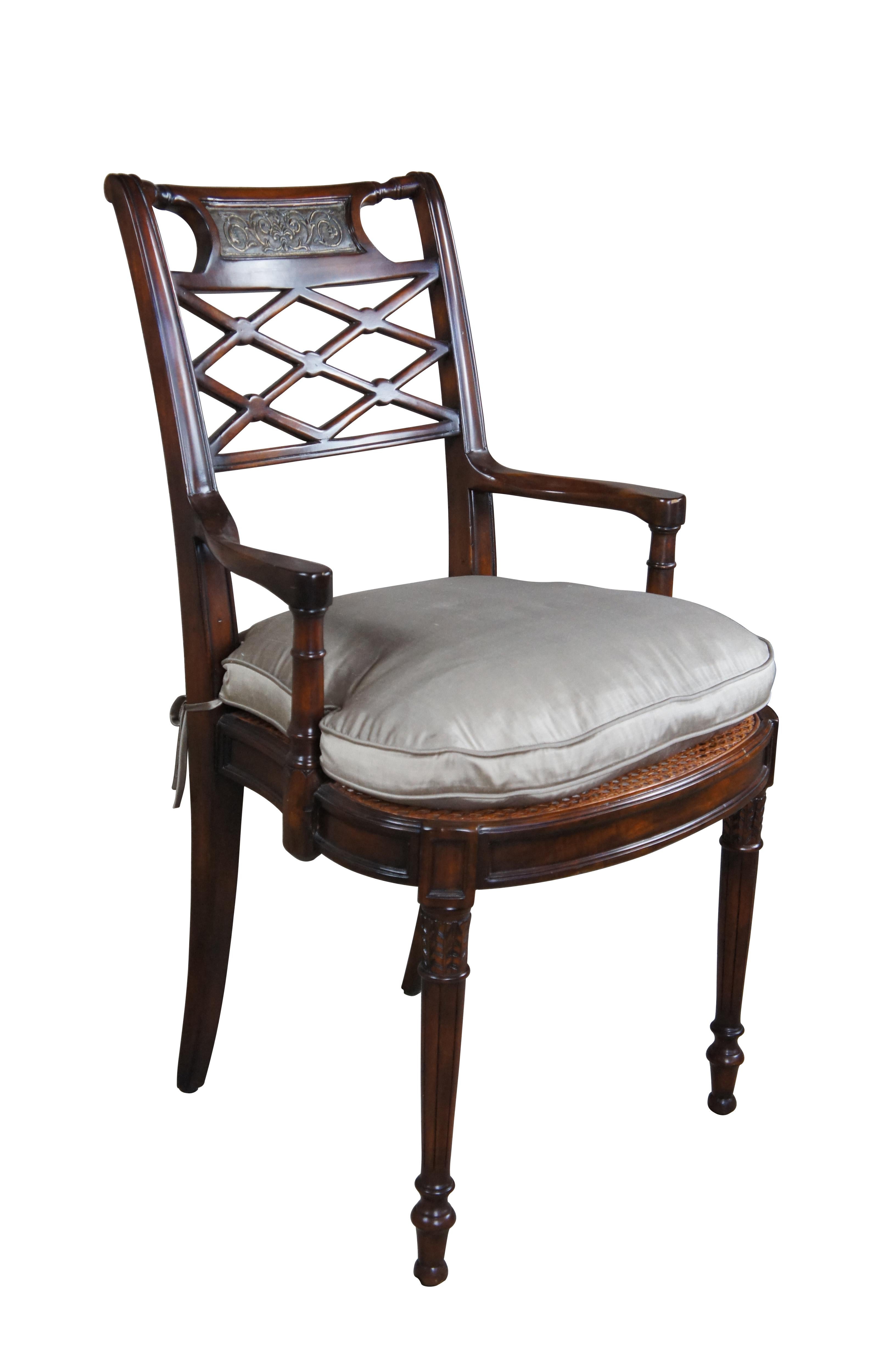Theodore Alexander Adorned with Silk Bows Side Chair, 4100-236.  A hand carved armchair, the bar toprail inset with a 'bronzed' repoussé plaque above a lattice pierced back, on a caned seat with a tie-on cushion, flanked by recessed arms, on turned