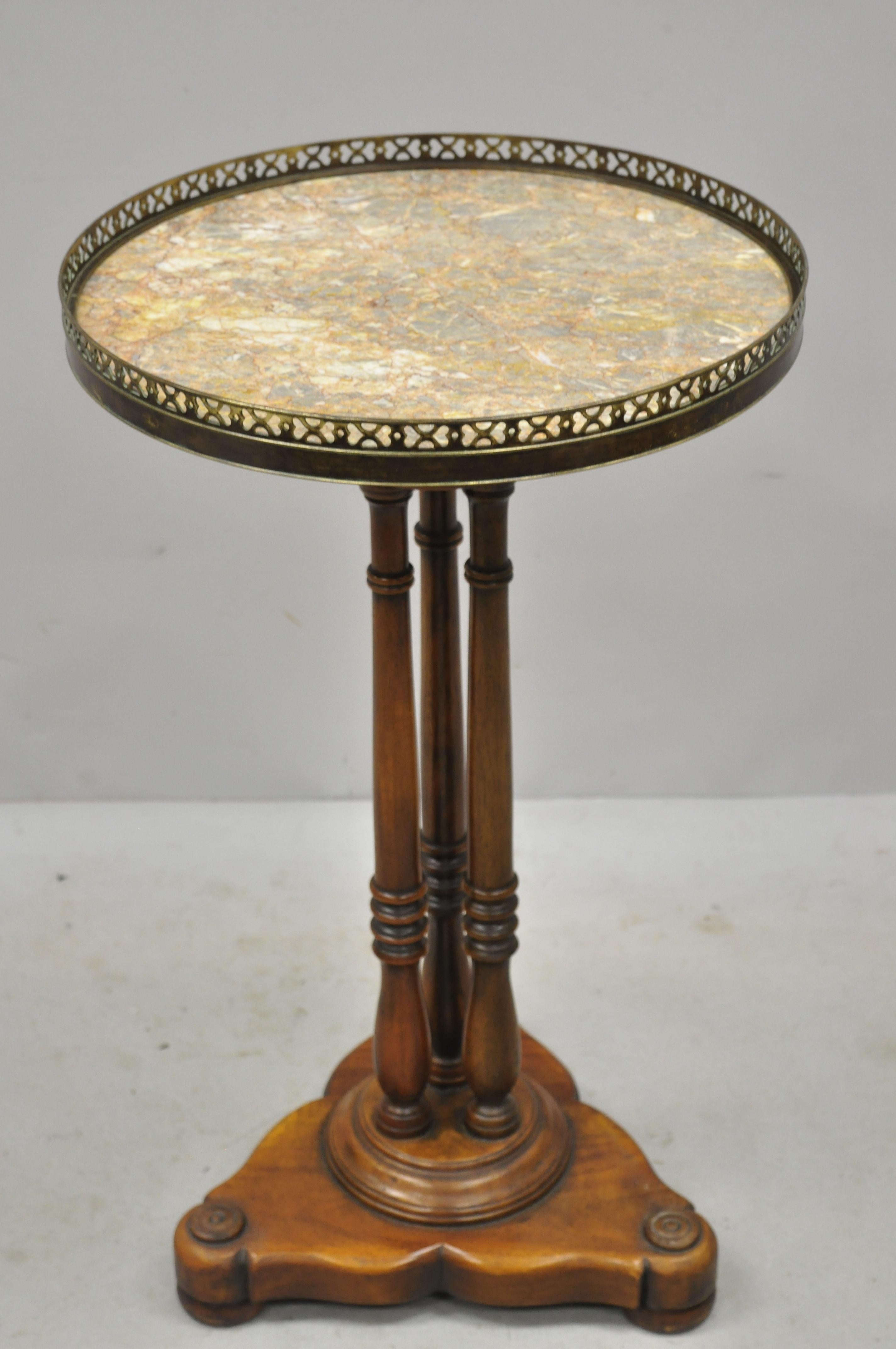 Theodore alexander marble-top French empire pedestal base accent side table. Listing includes an inset marble top, brass gallery, solid wood frame, beautiful wood grain, nicely carved details, original label, great style and form, circa late 20th