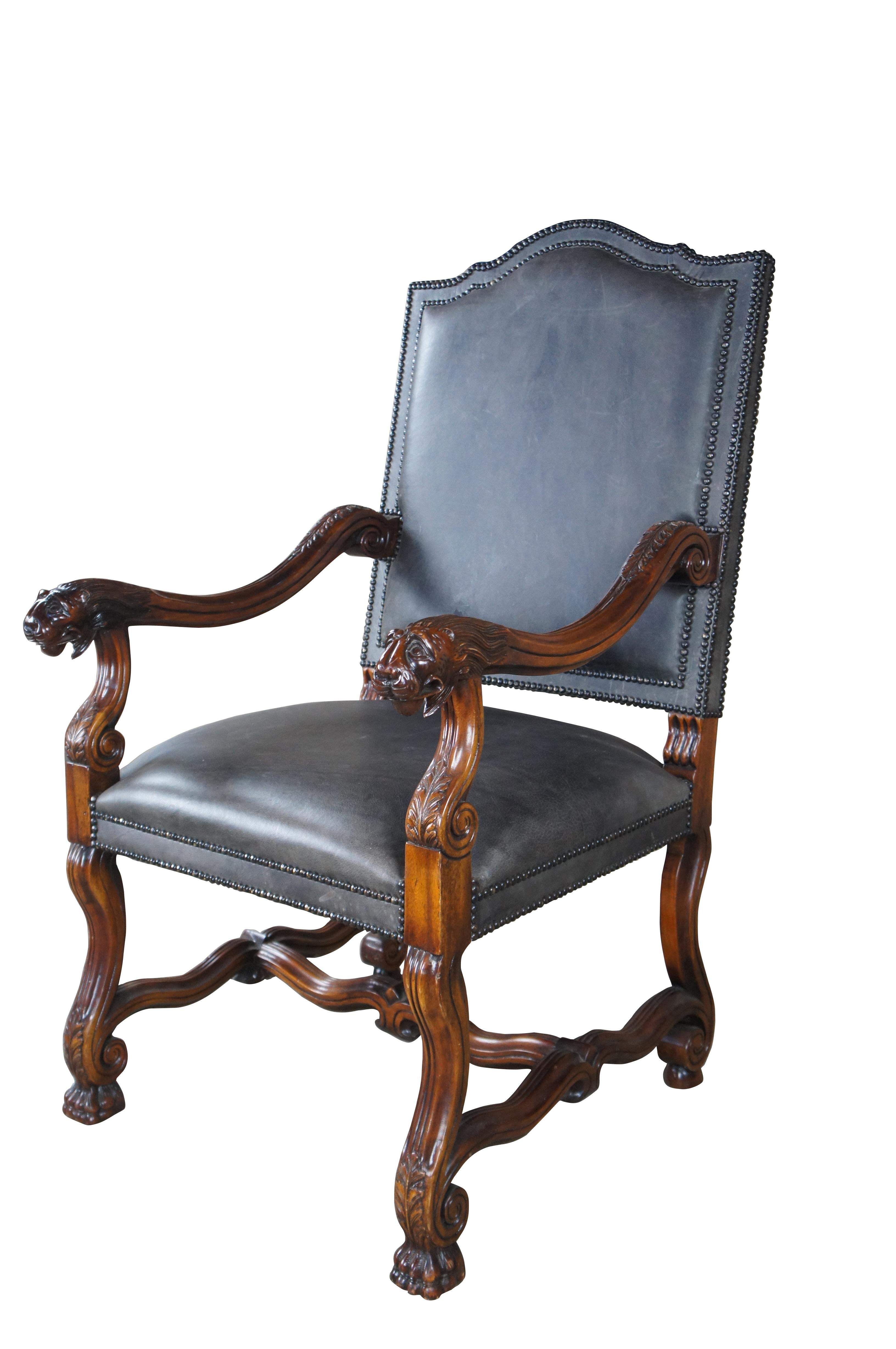 An Exquisite Theodore Alexander Throne Chair, circa late 20th Century. Inspired by 17th Century Italian Tuscan and Spanish designs. Features a mahogany frame with high back and contoured crest rail. Acanthus carved arms are scrolled and downswept