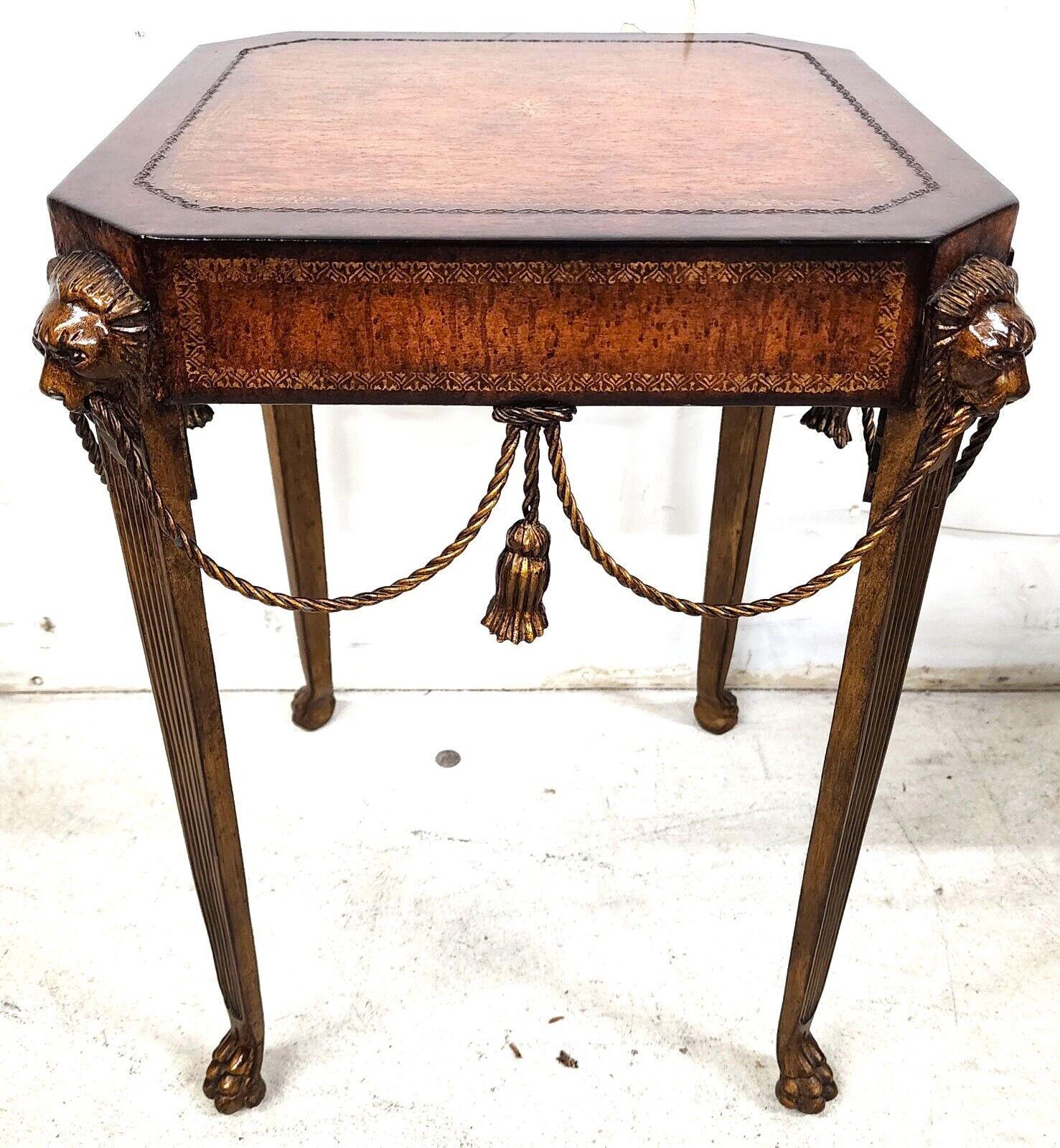 For FULL item description click on CONTINUE READING at the bottom of this page.
Offering One Of Our Recent Palm Beach Estate Fine Furniture Acquisitions Of A Theodore Alexander Style Bronze Legs, Lion Heads and Rope & Tassel Side Drink Table
With