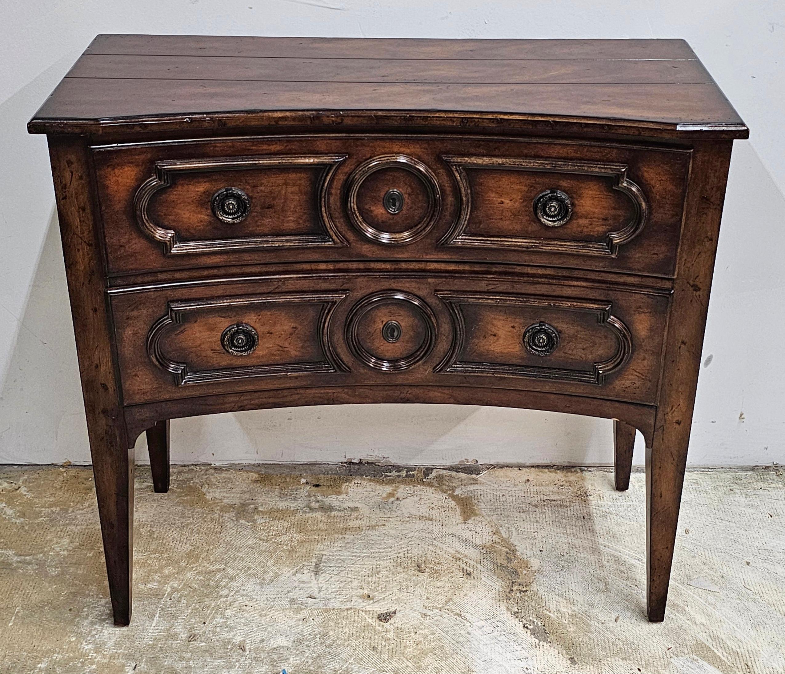 Theodore Alexander Style Walnut Two-Drawer Commode. Measures 34