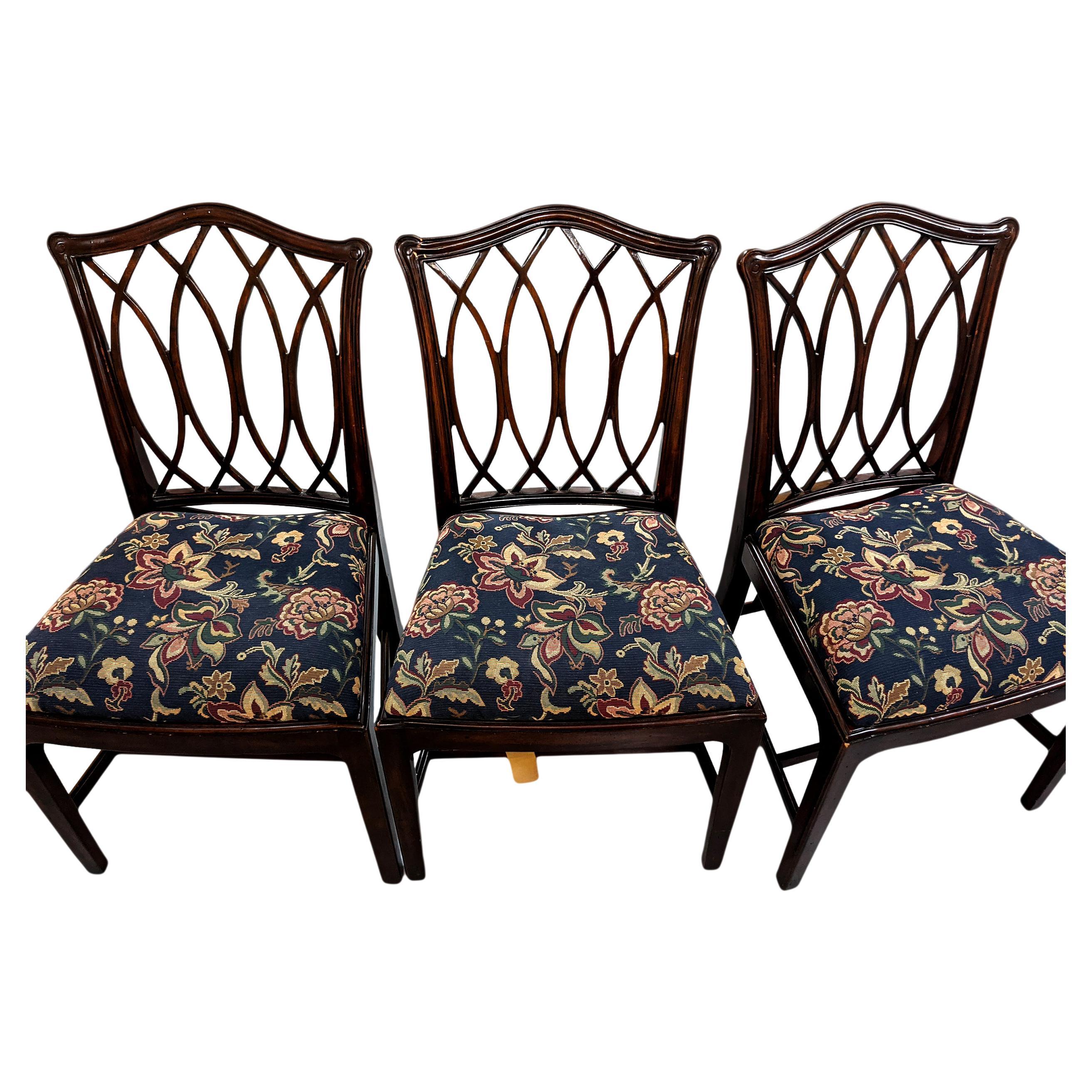 The Theodore Alexander Trellis Chair is a very good reproduction of the George III style of 1780. It brandishes a bowed seat and interlacing fretwork on its back. It's made of a dense mahogany and is handcrafted quality furniture. This side chair