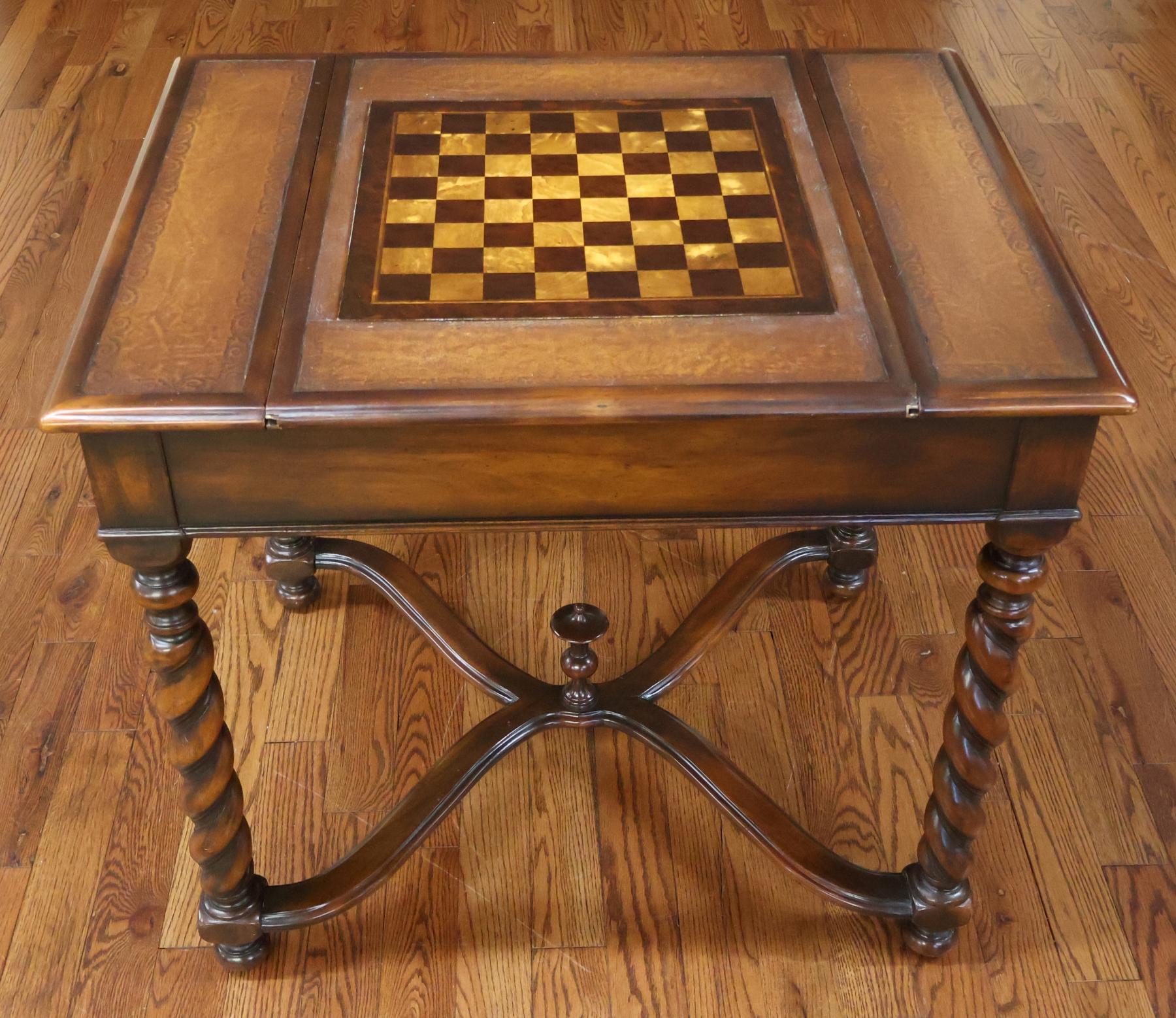 Theodore Alexander Walnut And Burled Walnut Spiral Leg Leather Top Game Table

Dimensions : 34
