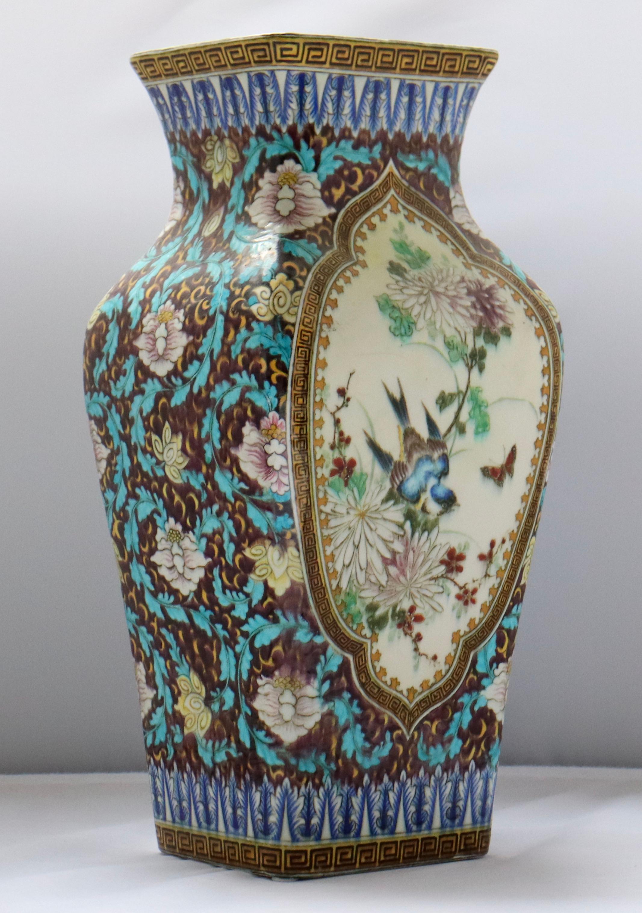 Theodore Deck (1823-1891) 
A Polychromed Faience quadrangular vase, decorated in a cartouche with butterfly and birds on branches of prunus and peonies in the Japanese Taste on a purple background of foliage and flowers, the base with Greek friezes