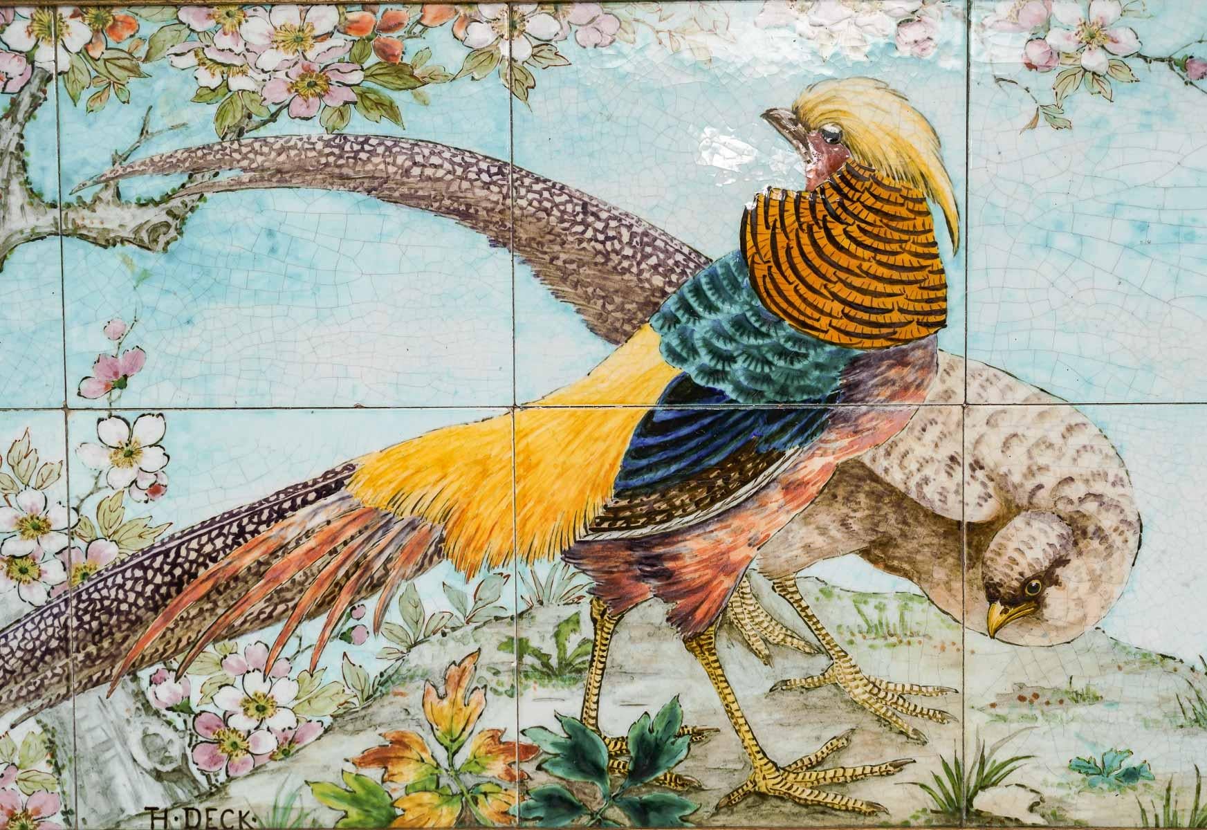 A Théodore Deck (1823-1891) Faience Paneled Fourteen-Tile Rectangular Wall Plaque

Polychromic Earthenware very finely hand-painted, designed with a couple of pheasants among vegetation, daisies and poppies, a flying swallow symbolizing