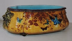 Centro de mesa de loza esmaltada Théodore Deck, hacia 1870