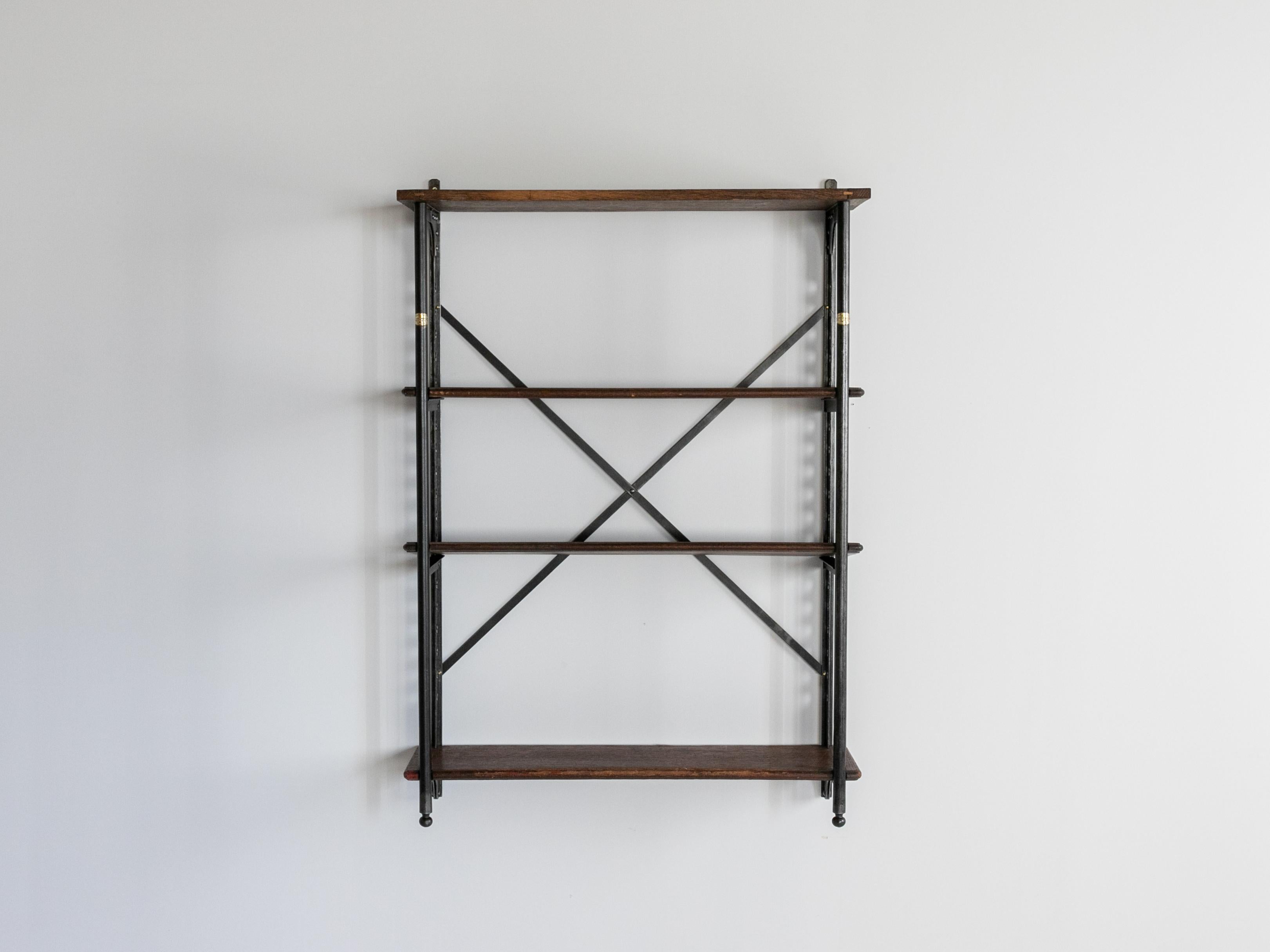 Theodore Scherf France circa 1900 stamped with makers mark

Industrial shelf manufactured by Theodore Scherf.
Originally used in a textile factory, the shelves are movable.
It can be used as a wall hanging, but can also be placed on the floor as