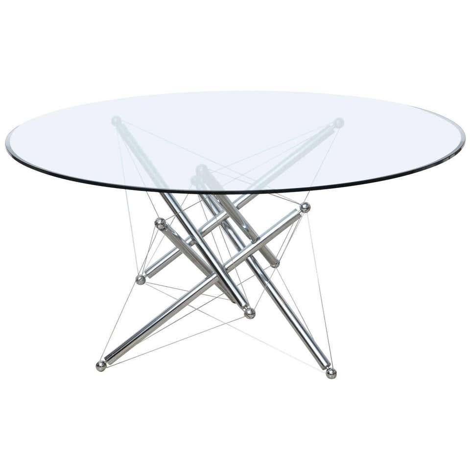 Sculptural dining table model 714 designed by Theodore Waddell and manufactured by Cassina, Italy, 1973. The table has a very nice sculptural base with chrome metal tubes connected with metal wires. By turning the tubes you can adjust the table in