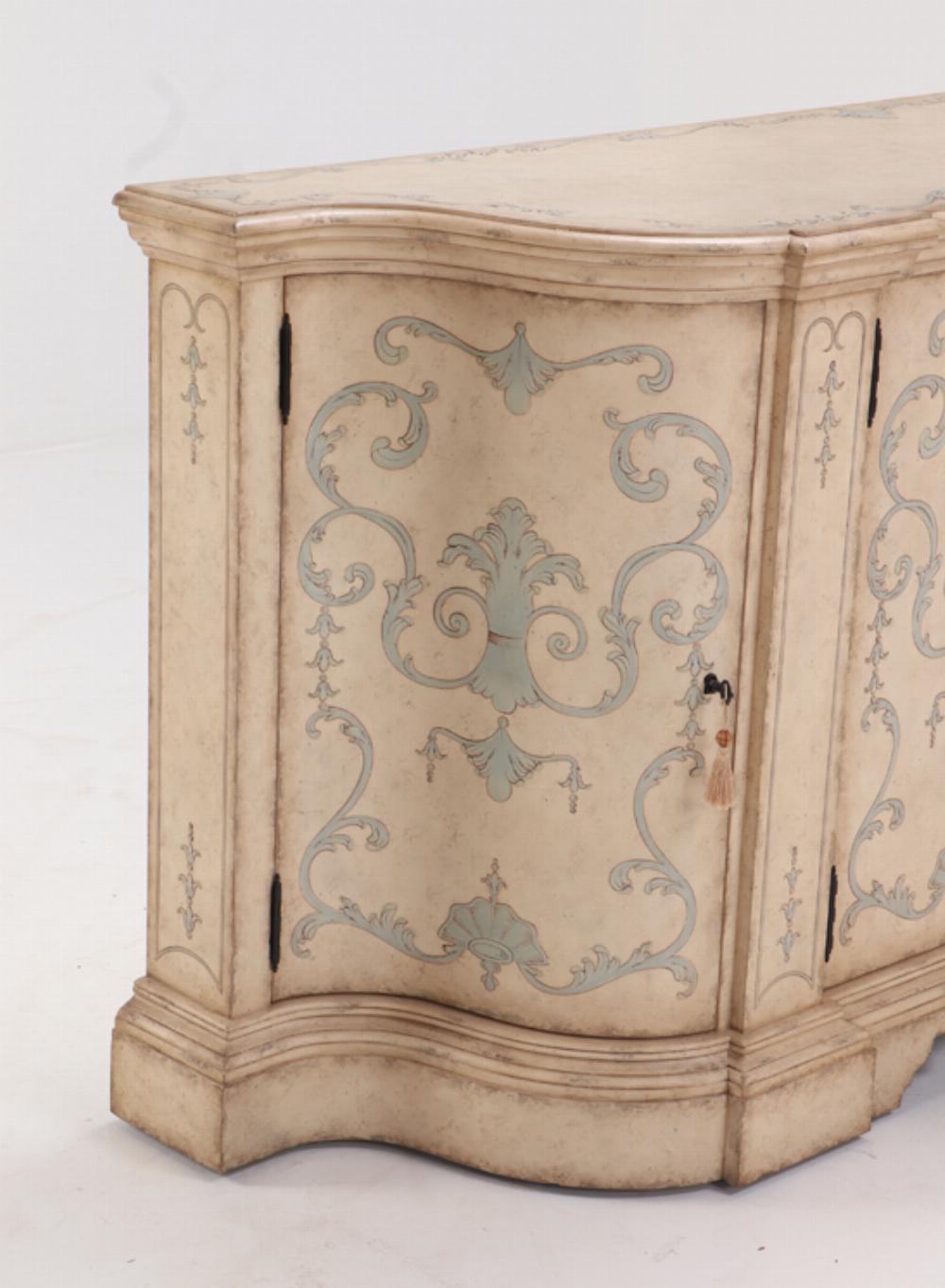 Theodre Alexander Venetion style painted sideboard or credenza done is cream and pale blue. This piece sold for more than 7,000.00 when new.