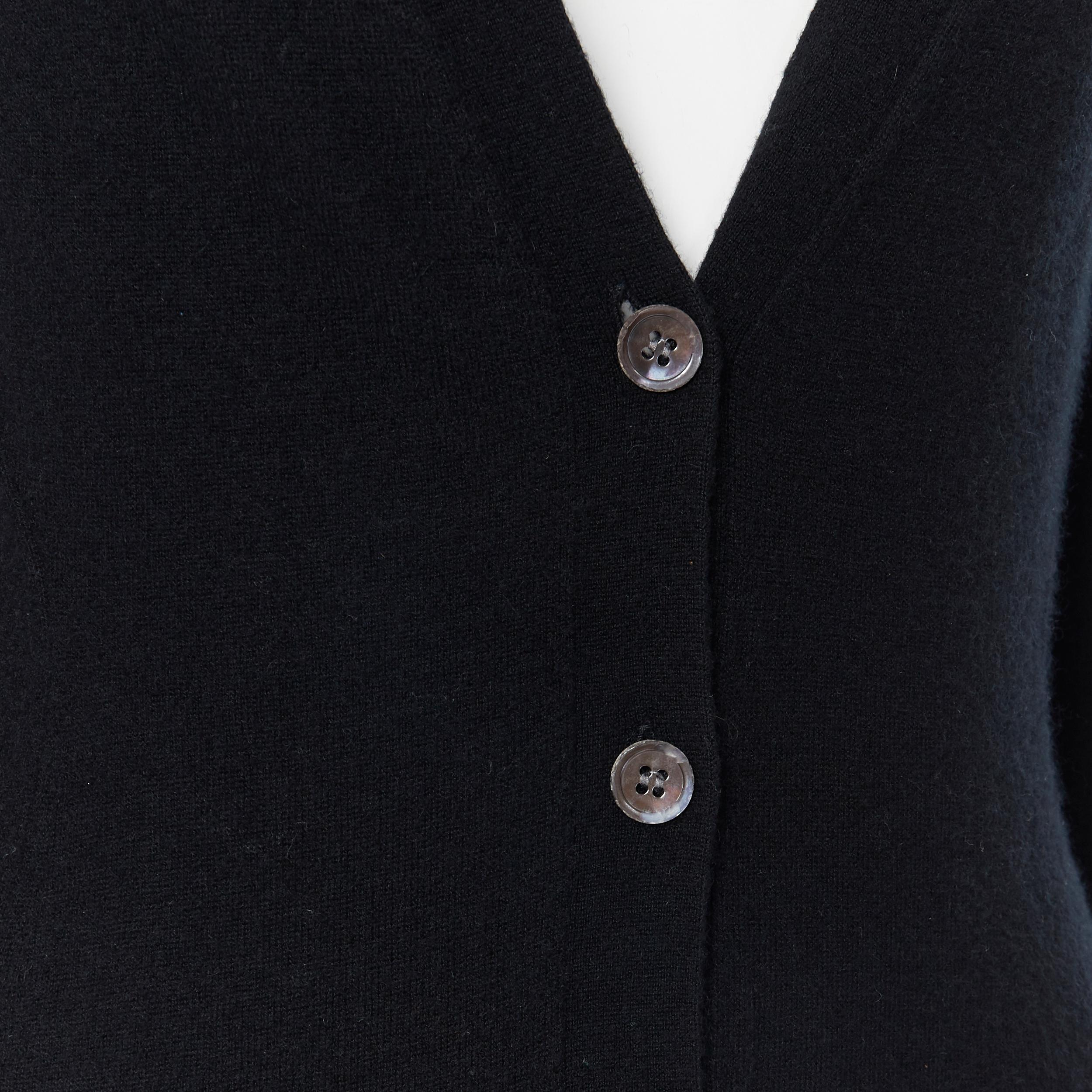 THEORY 100% cashmere mother of pearl buttons long line cardigan sweater XS
Brand: Theory
Model Name / Style: Cashmere cardigan
Material: Cashmere
Color: Black
Pattern: Solid
Closure: Button
Extra Detail: Long length cardigan. Long sleeve. V-neck