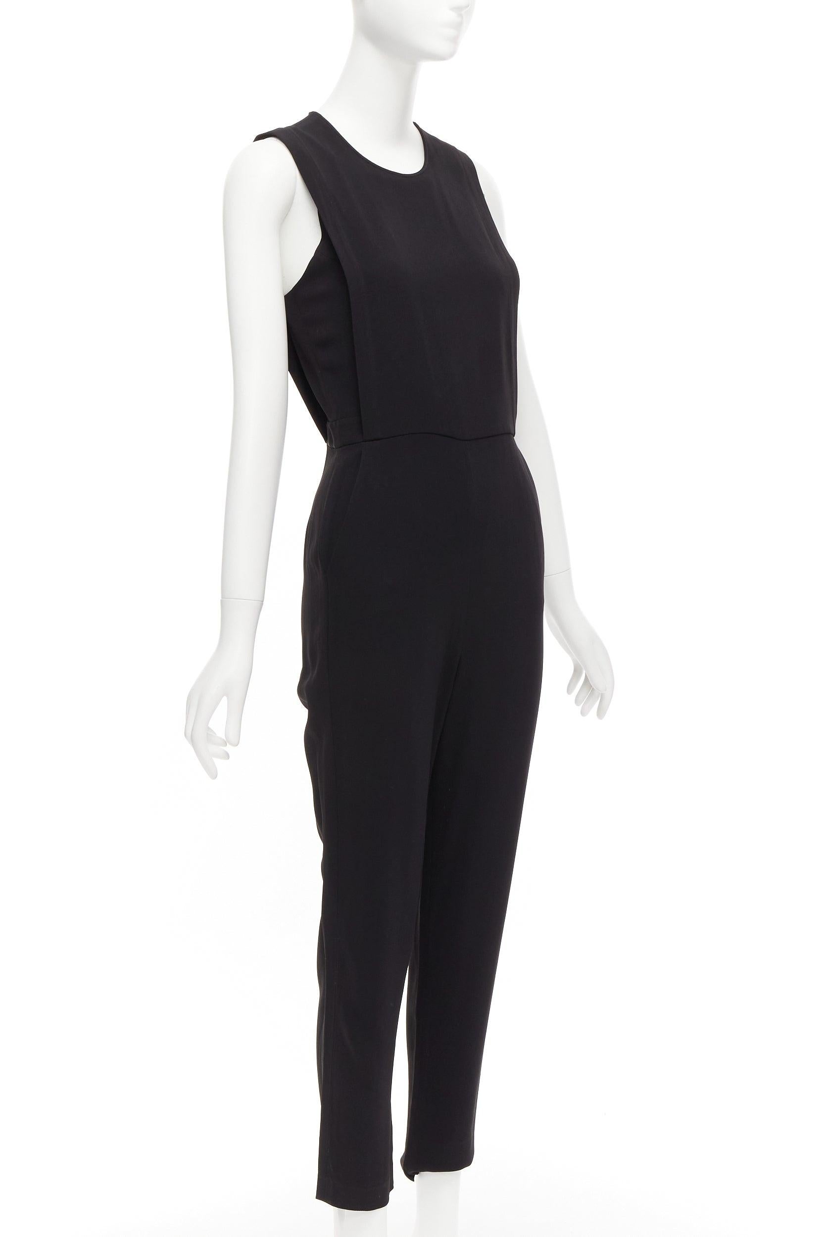 THEORY black layered top back zip cropped sleeveless jumpsuit US0 XS
Reference: CELG/A00373
Brand: Theory
Material: Viscose, Blend
Color: Black
Pattern: Solid
Closure: Zip
Lining: Black Fabric
Extra Details: Zip and hook and eye closure at