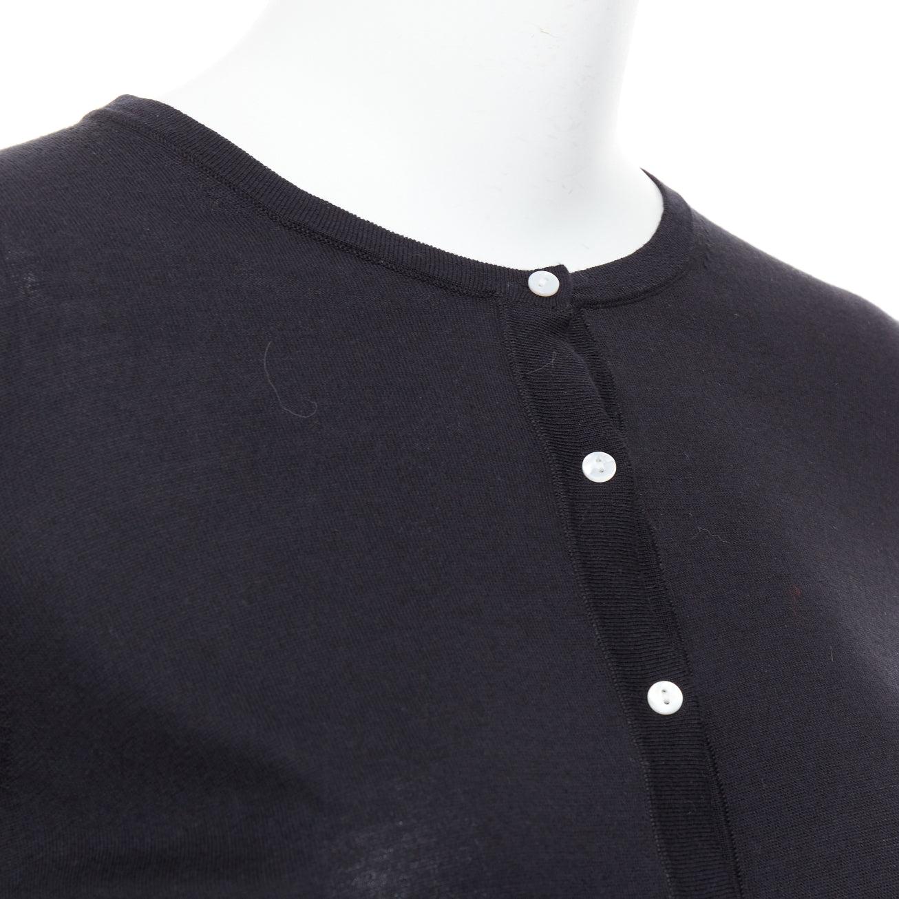 THEORY black silk cotton white buttons crew neck cardigan S
Reference: NILI/A00095
Brand: Theory
Material: Silk, Cotton
Color: Black, White
Pattern: Solid
Closure: Button
Made in: China

CONDITION:
Condition: Excellent, this item was pre-owned and
