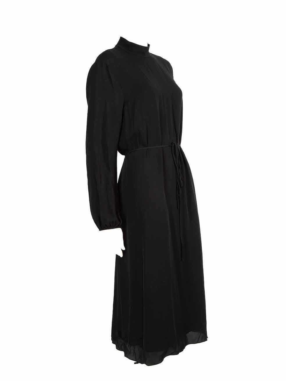 CONDITION is Very good. Minimal wear to dress is evident. Minimal wear to the neckline button fastening at the rear with the top button missing on this used Theory designer resale item.
 
 
 
 Details
 
 
 Black
 
 Silk
 
 Long sleeves dress
 
 Midi