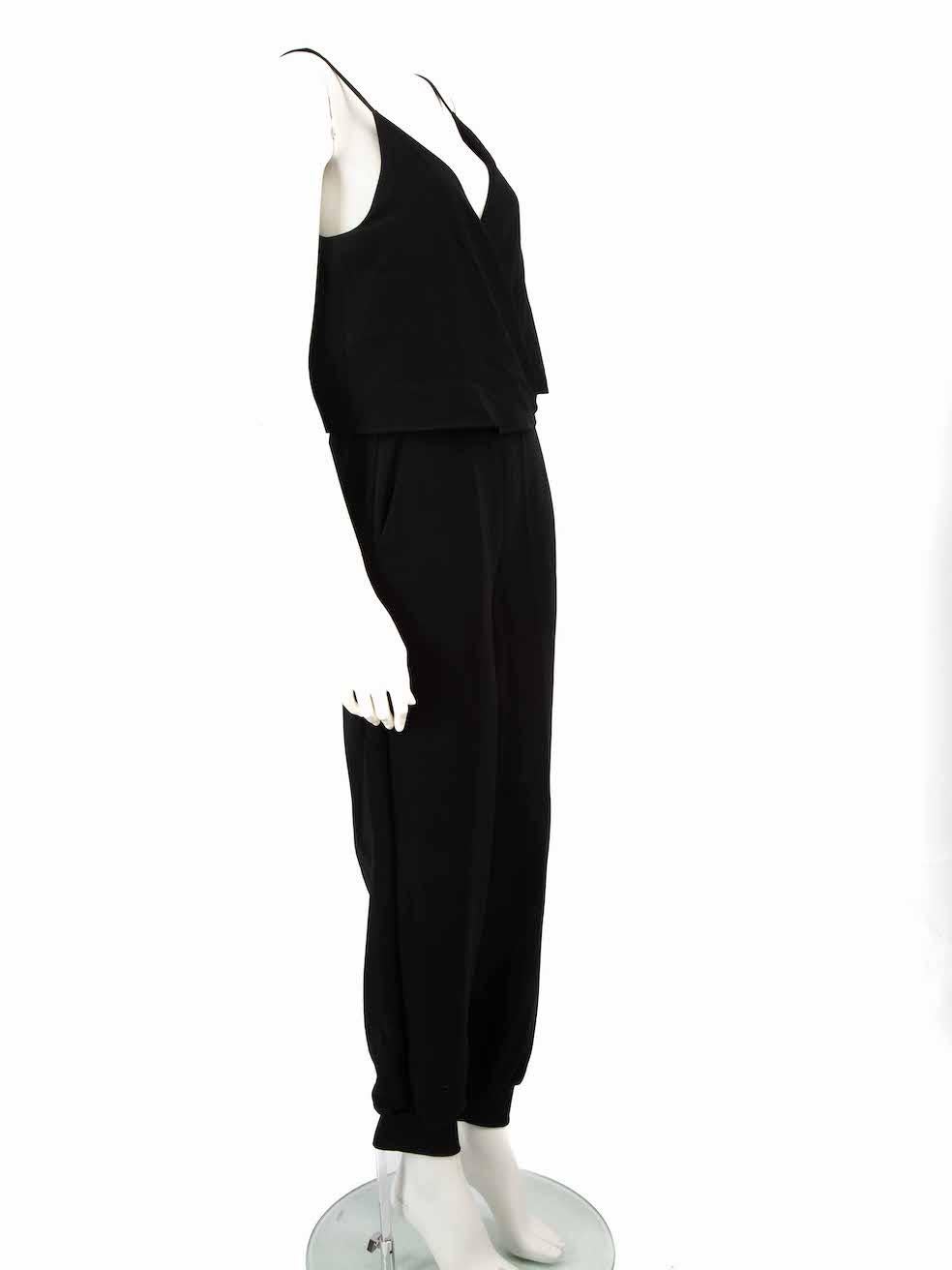CONDITION is Never worn, with tags. No visible wear to jumpsuit is evident on this new Theory designer resale item.
 
 
 
 Details
 
 
 Black
 
 Synthetic
 
 Jumpsuit
 
 Sleeveless
 
 Plunge neck
 
 Ribbed cuffs
 
 Button fastening
 
 2x Back