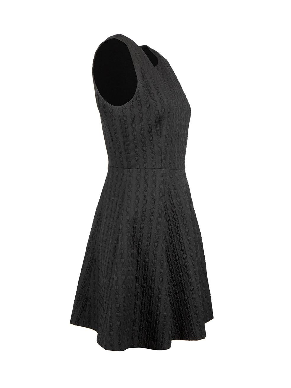 CONDITION is Good. Small white marks along underarms and slight staining along front of dress. General wear to this used Theory designer resale item.
 
 
 
 Details
 
 
 Black
 
 Polyester
 
 Mini dress
 
 Sleeveless
 
 Back zip fastening
 
 Round