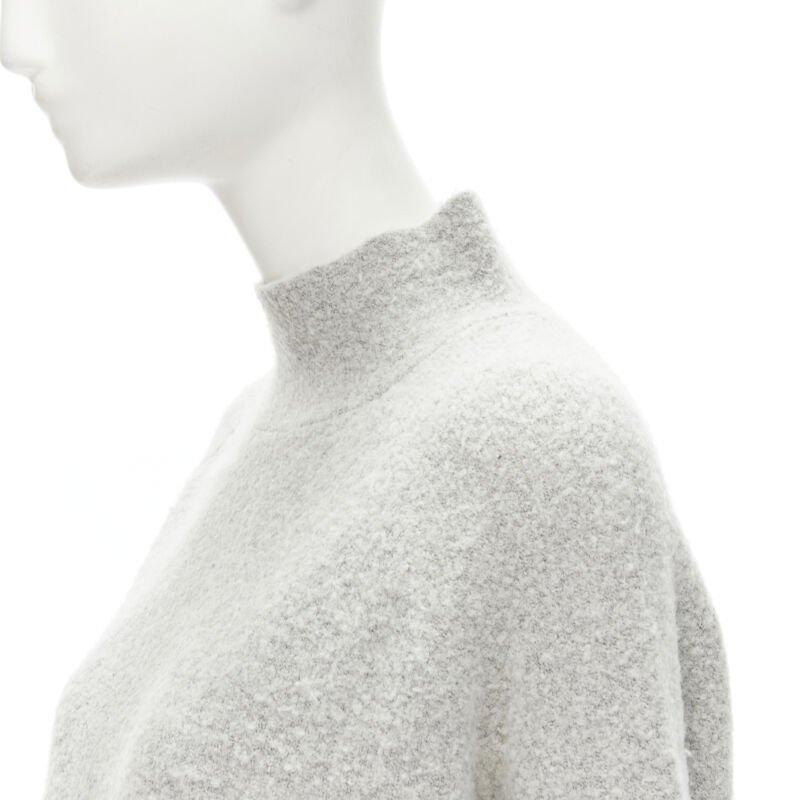 THEORY maglione grigio in misto lana con collo a listino e orlo a gradino XS
Riferimento: KNLM/A00094
Marchio: Theory
Materiale: Lana, poliammide
Colore: Grigio
Modello: Tinta unita
Dettagli extra: Colletto in piedi. Manica raglan. Orlo alto e