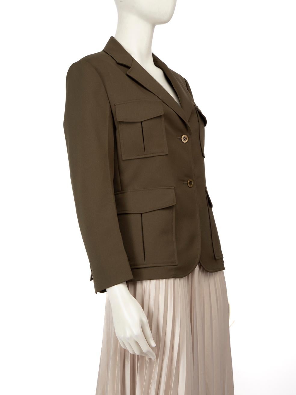 CONDITION is Very Good. Hardly any visible wear to blazer is evident on this used Theory designer resale item.
 
 Details
 
 
 Khaki 
 
 Polyester
 
 Blazer
 
 Single breasted
 
 Doublr button detail
 
 4x Front pockets
 
 Front button fastening
 
