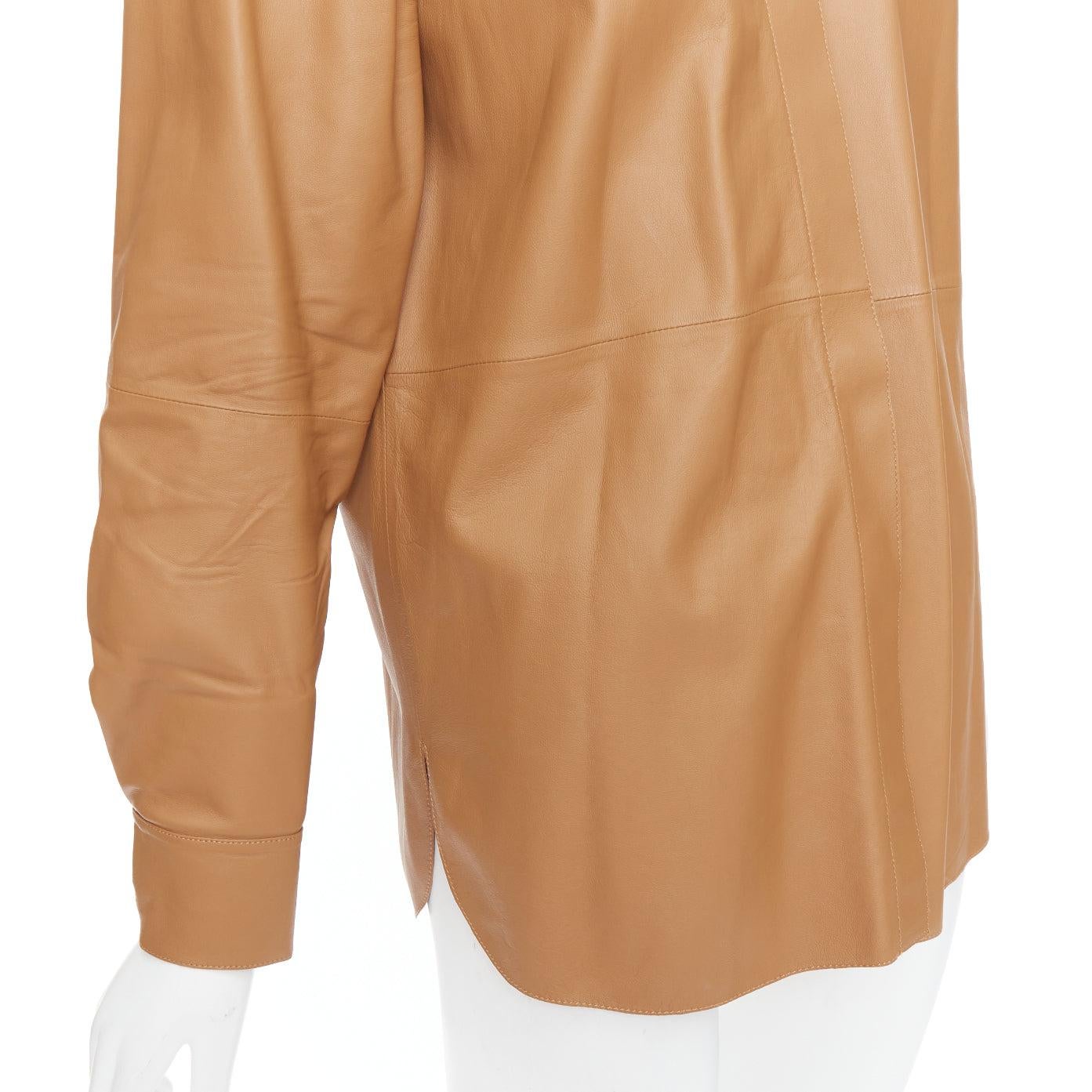 THEORY L Nappa Shine brown lambskin leather panelled shirt XS
Reference: KNLM/A00406
Brand: Theory
Model: L Nappa Shine
Material: Leather
Color: Brown
Pattern: Solid
Closure: Button
Made in: Turkey

CONDITION:
Condition: Very good, this item was