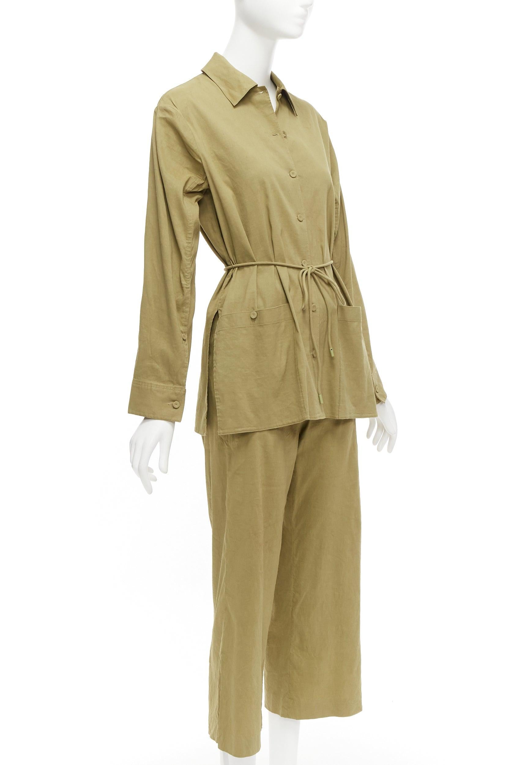 THEORY olive green linen blend tie belt relaxed jacket wide leg pants set US0 XS
Reference: JACG/A00147
Brand: Theory
Material: Linen, Blend
Color: Green
Pattern: Solid
Closure: Belt
Extra Details: Fabric wrap buttons.
Made in: