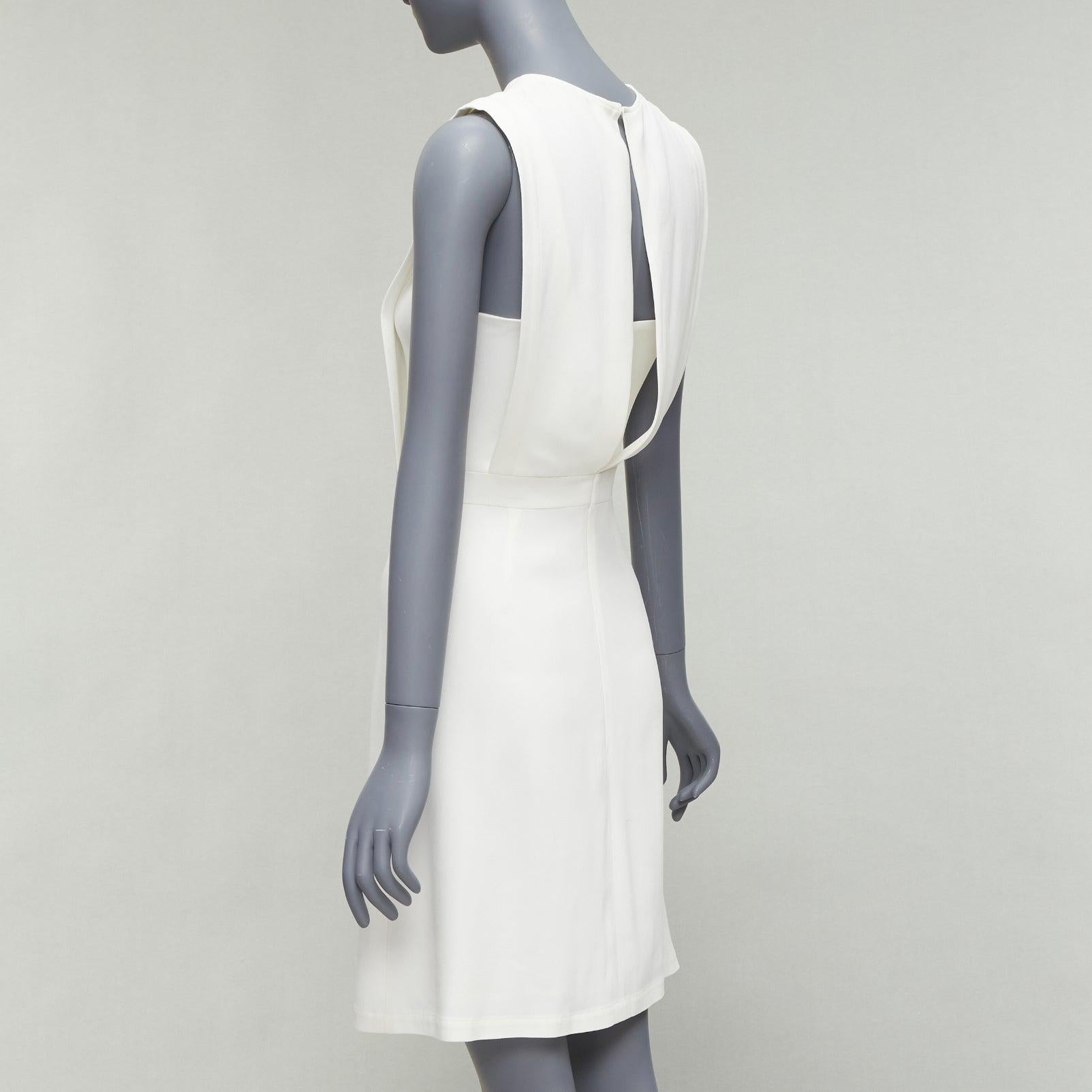 THEORY Rimlan white silky layered top A-line dress US0 XS
Reference: CELG/A00392
Brand: Theory
Model: Rimlan
Material: Viscose, Blend
Color: White
Pattern: Solid
Closure: Zip
Lining: White Fabric
Extra Details: Zip and hook and eye closure at