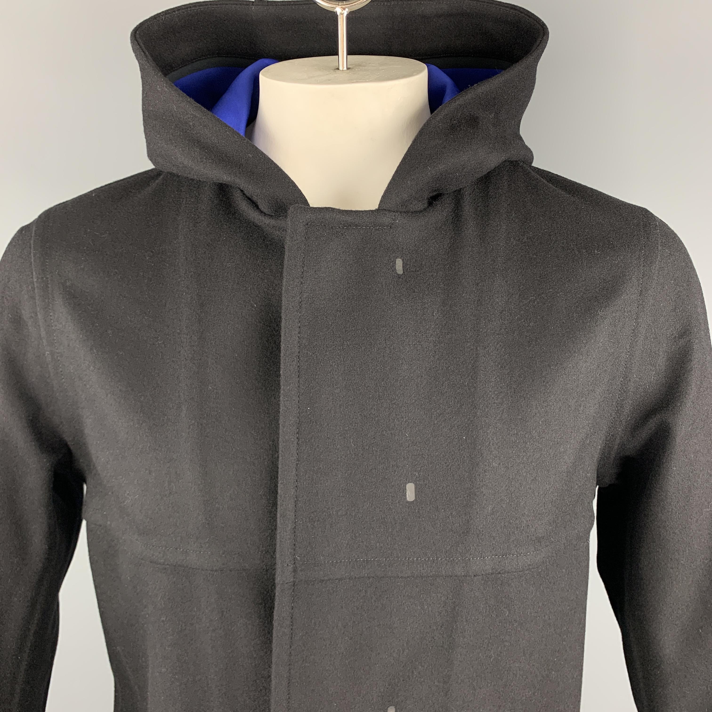 THEORY Coat comes in a solid black wool blend, with a hood, 5 hidden buttons at closure, single breasted, patch pockets, unbuttoned cuffs, unlined.

New with Tags.
Marked: M

Measurements:

Shoulder: 17.5 in. 
Chest: 44 in. 
Sleeve: 25.5 in.