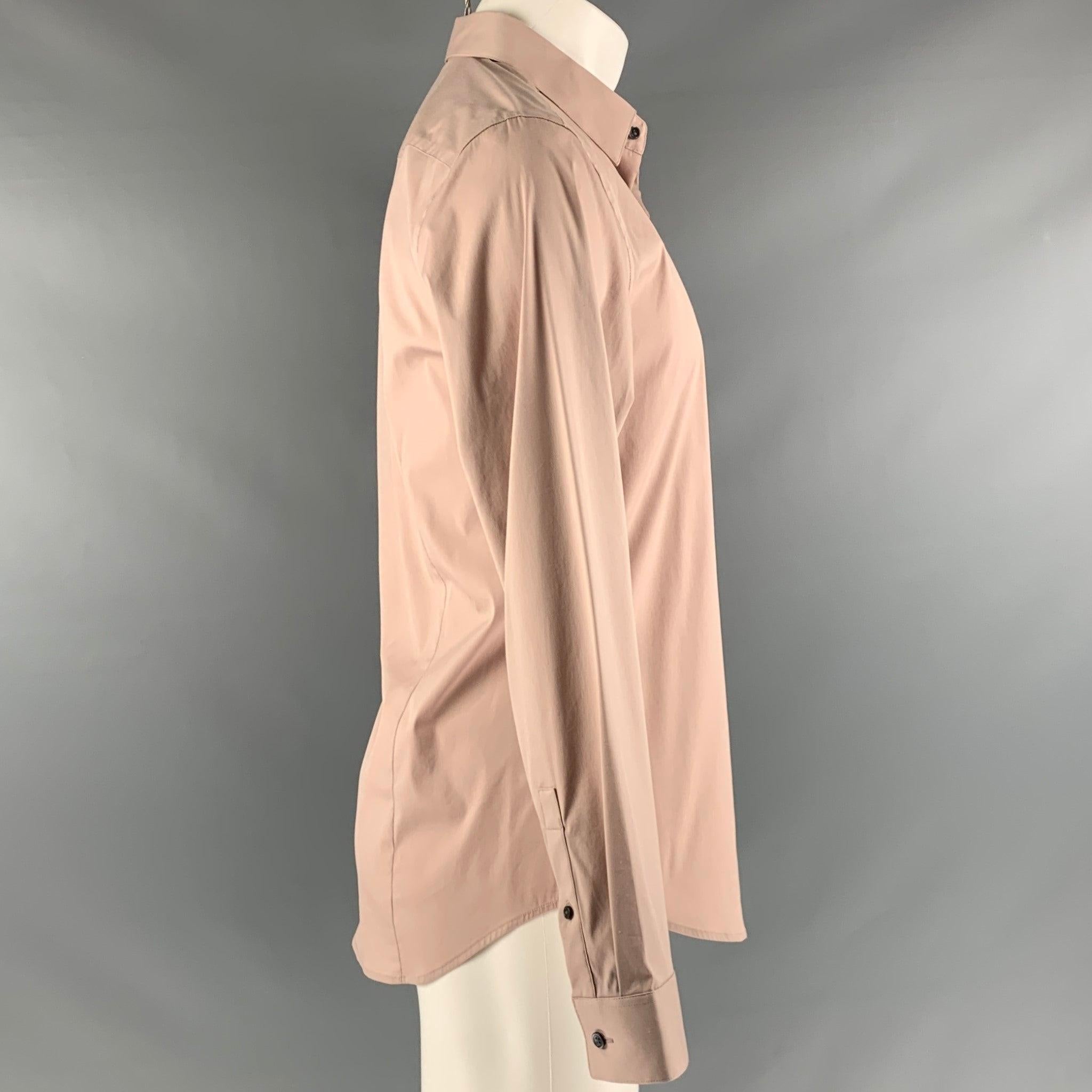 THEORY
long sleeve shirt in a dusty pink cotton blend featuring a regular fit and spread collar.Very Good Pre-Owned Condition. Minor pilling. 

Marked:   XL 

Measurements: 
 
Shoulder: 18 inches Chest: 41 inches Sleeve: 27 inches Length: 28 inches