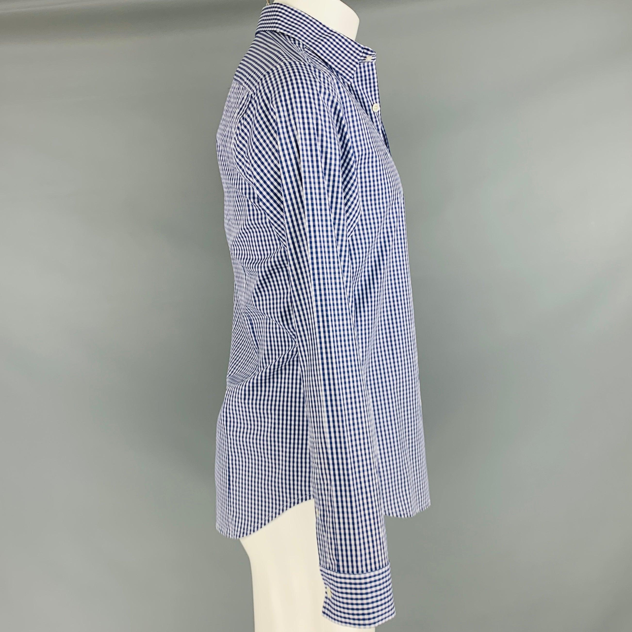 THEORY long sleeve shirt
in a navy and white cotton fabric featuring checkered pattern, spread collar, and button closure. New with Tags. 

Marked:   S 

Measurements: 
 
Shoulder: 15.5 inches Chest: 40 inches Sleeve: 25.5 inches Length: 29 inches 
