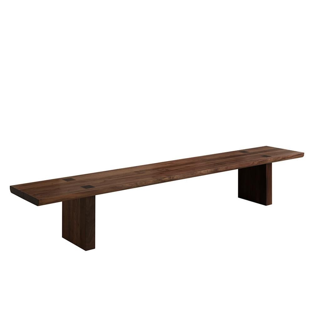 Bench Theos in solid walnut wood, with a gap in the
middle of the seat, with visible squares feet's fixations
on the seat. With rounded edges.
Also available in solid oak, on request.
Available in:
L 180 x D 45.3 x H 45cm, price: 5500,00€
L 200 x D